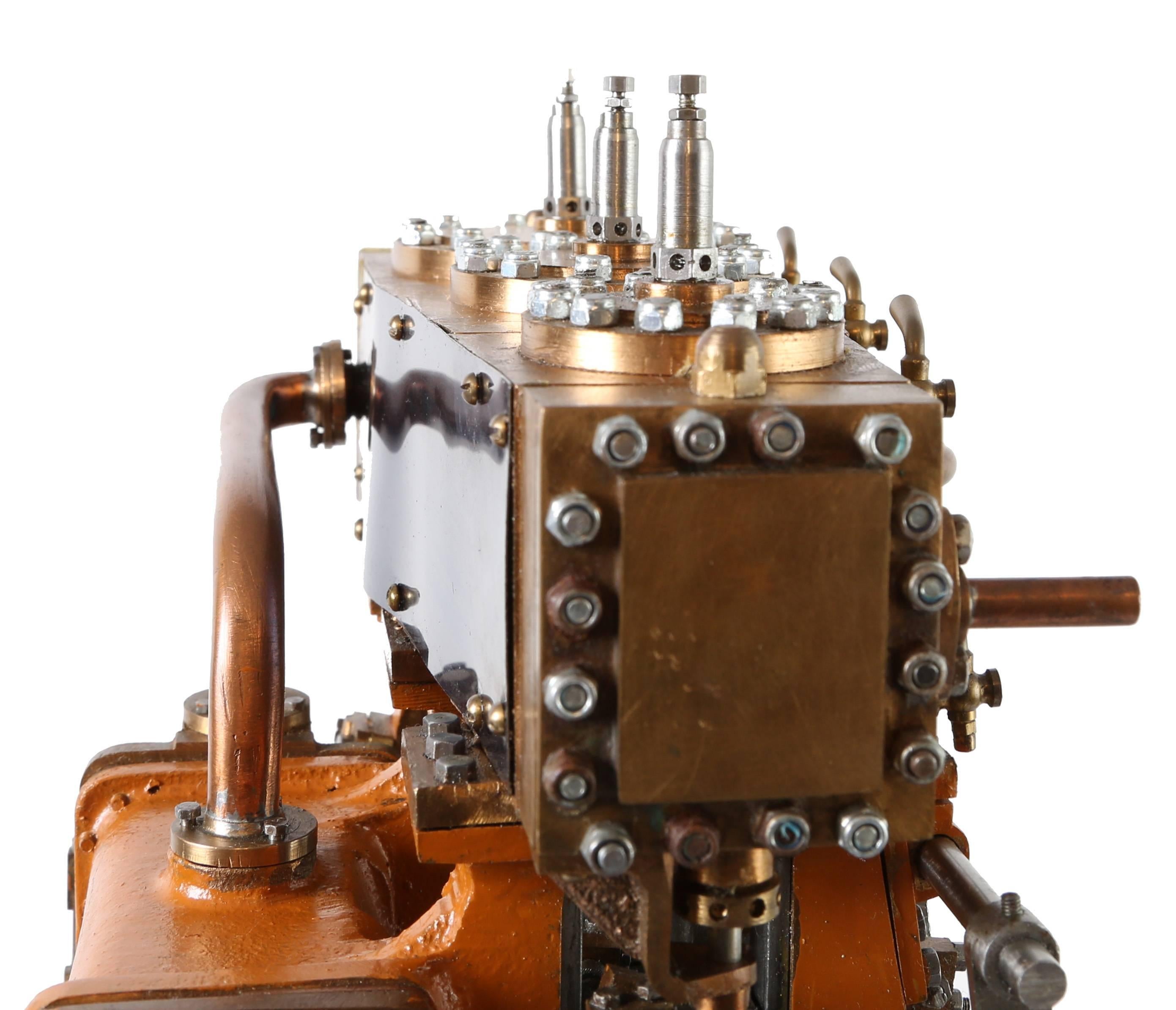 A beautifully constructed scale model of a triple expansion marine steam engine to the O. B. Bolton design, in working state (air pressure) The three cylinder triple expansion is typical of 19th century practice with condensing tank, air pump, slide