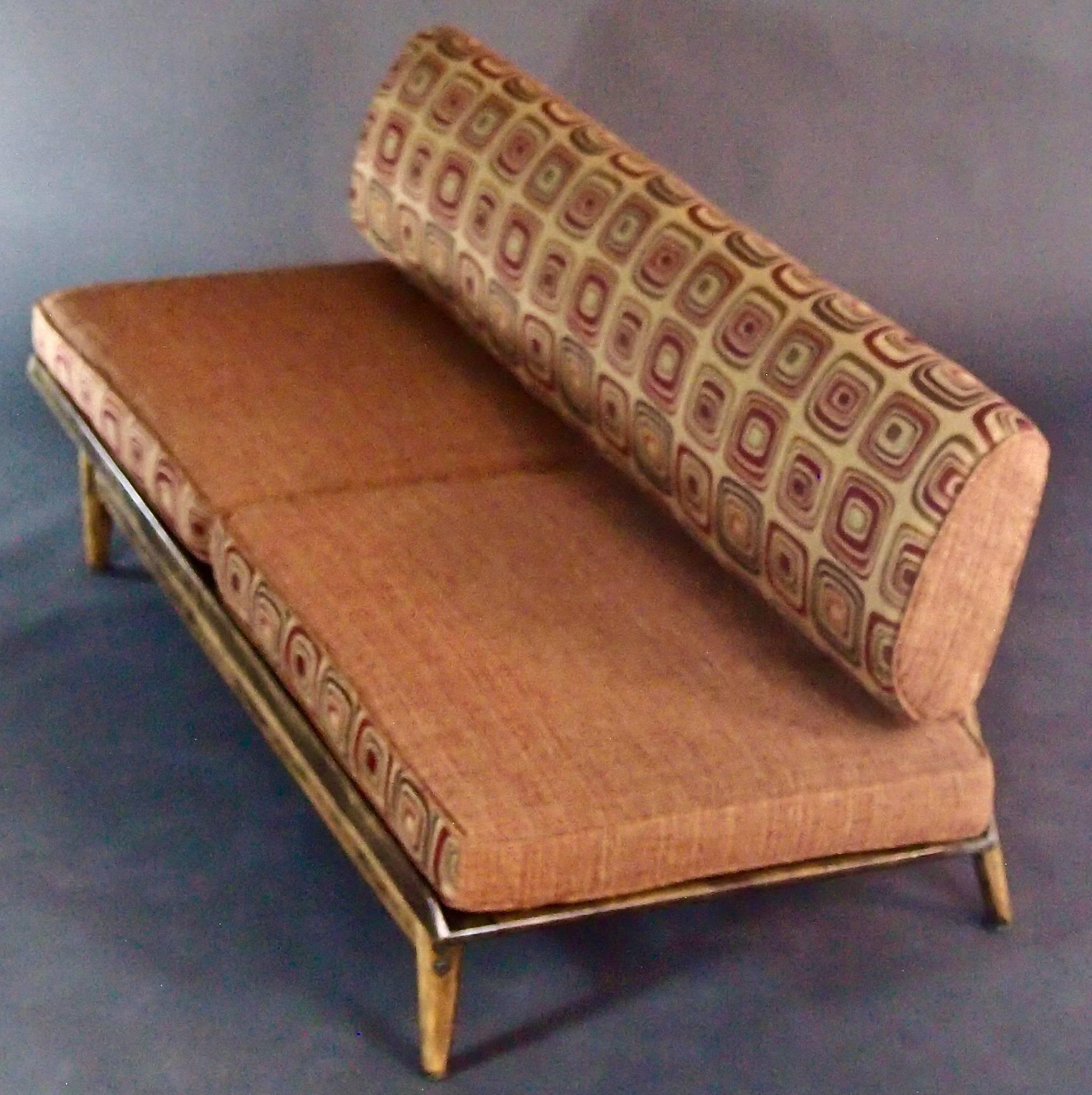 A generous slipper sofa with refinished wooden base and new vintage orange/rust tweed upholstery. The truly elegant shape is complemented by a retro graphic pattern. Collected in Palo Alto, CA in an original Mid-Century Modern housing development