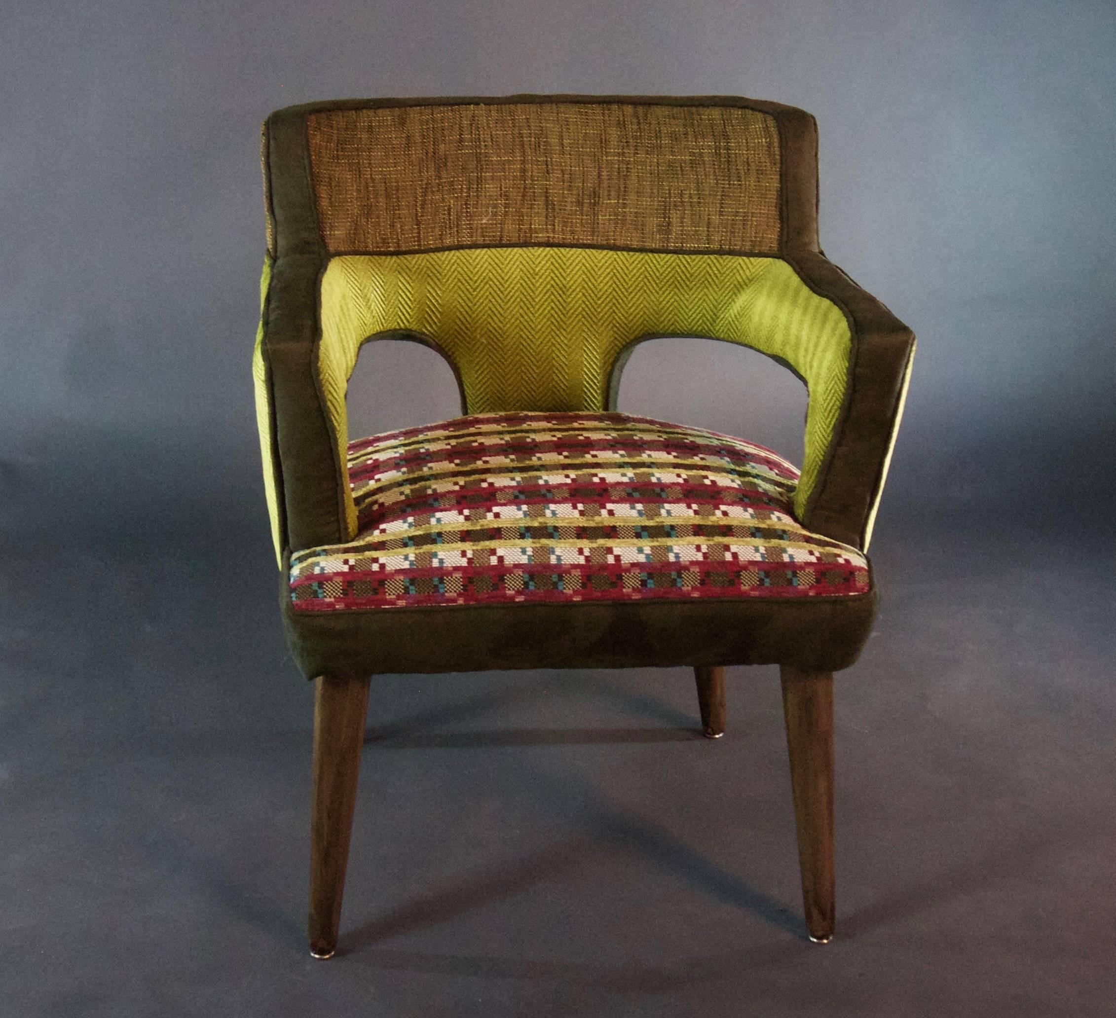 This armchair is reminiscent of 1960s fashion, featuring circular cut-outs in the back. A plaid seat and period chartreuse back and arms, accented by burnt umber trim and a tweed headrest. Unique, dramatic and comfortable.

Like all of our