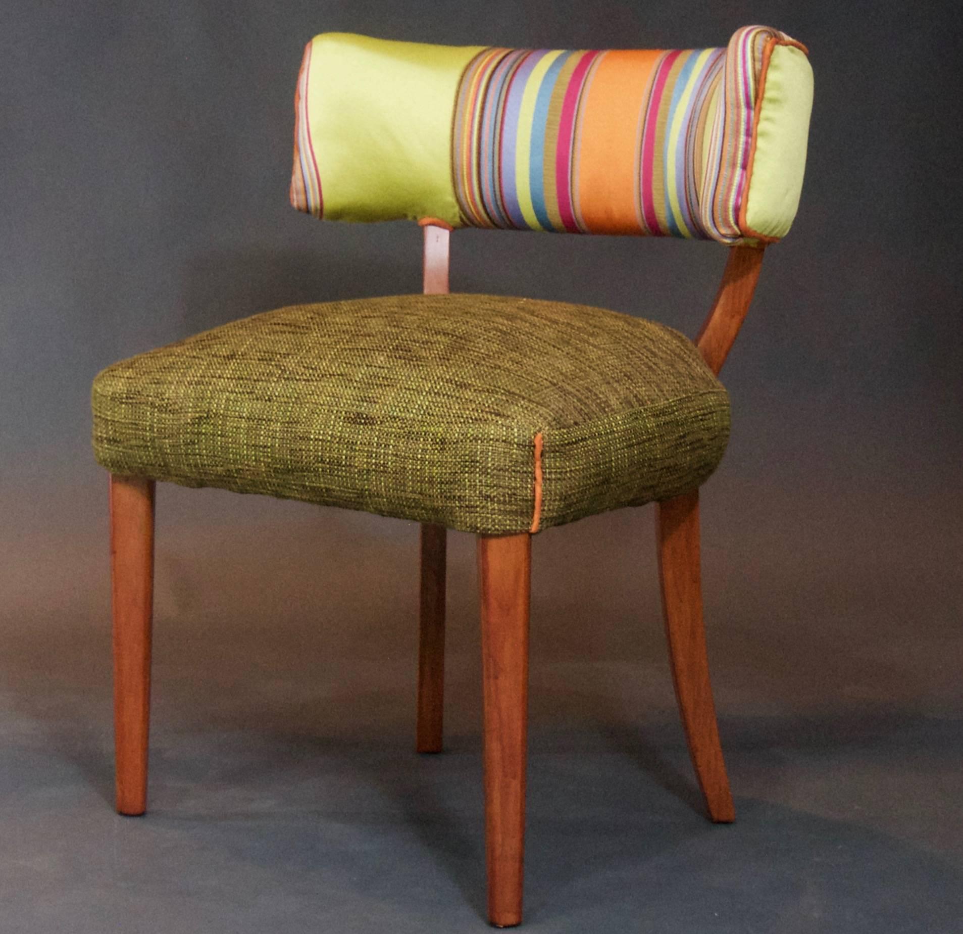 A cheery side chair with a sleek, striped backrest and tweedy seat trimmed in orange ultra suede.  Hardwood legs have been sanded and refinished with a rich pecan stain.  Coordinates nicely with our bench using the same striped fabric.

Like all