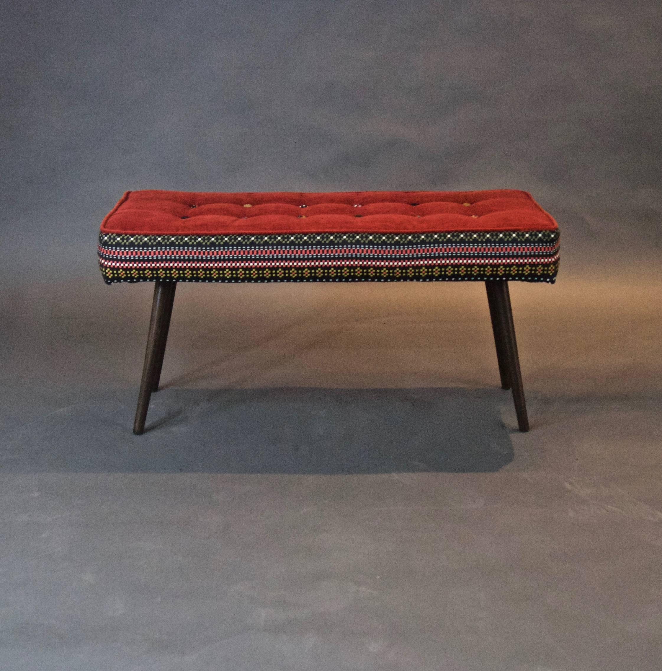 The Studio series bench is designed to add color and drama to an entryway, punctuate the end of a hallway, or adorn the foot of the bed.

The side panels are covered in our Folklorica weave print that can complement or enliven any room-traditional