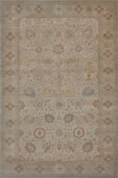Tapis contemporain bleu et beige tissé à la main inspiré de Tabriz