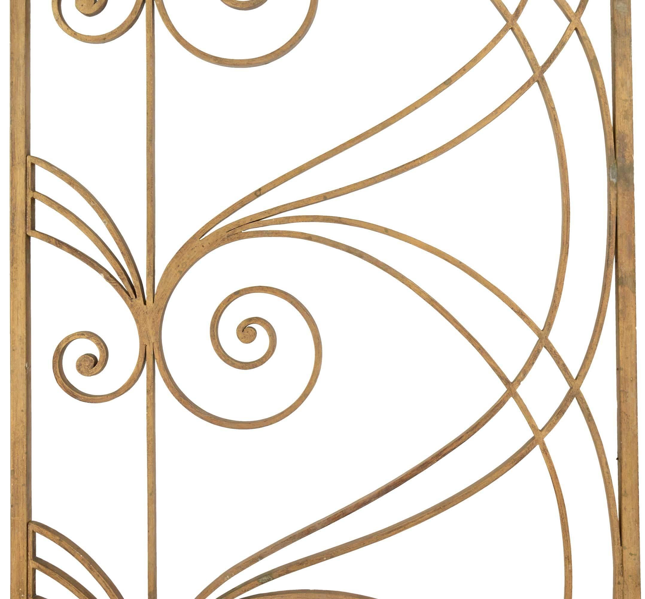 Stunning room divider made from three gold painted decorative scrolling iron panels. Perfect for in-home use, or as a lavish garden decoration.

Overall dimensions: 215.75