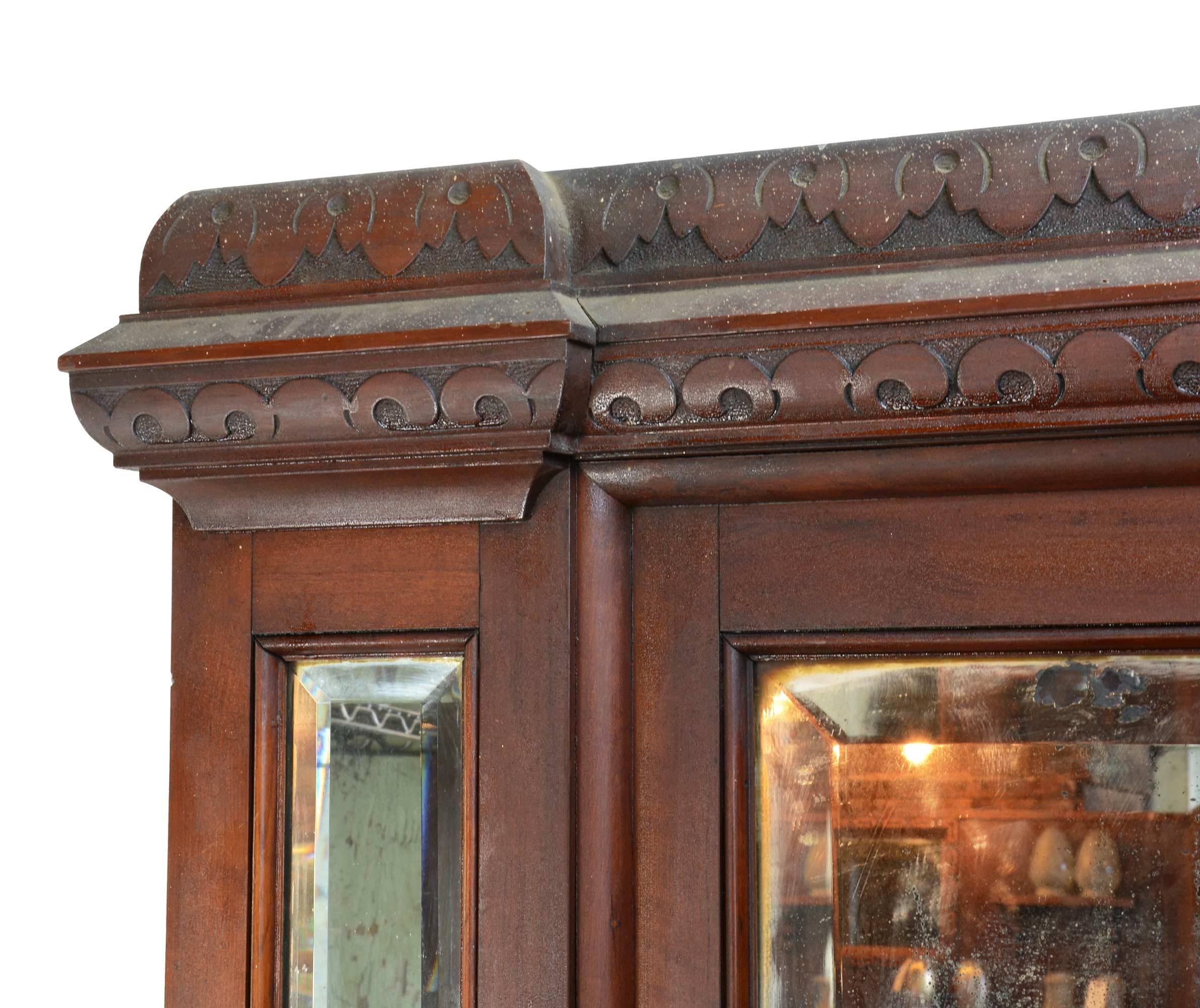 Full oak mantel with decorative carved legs featuring leafy details, and multiple beveled mirrors. Rich, original dark stain.

Box opening: 36.5