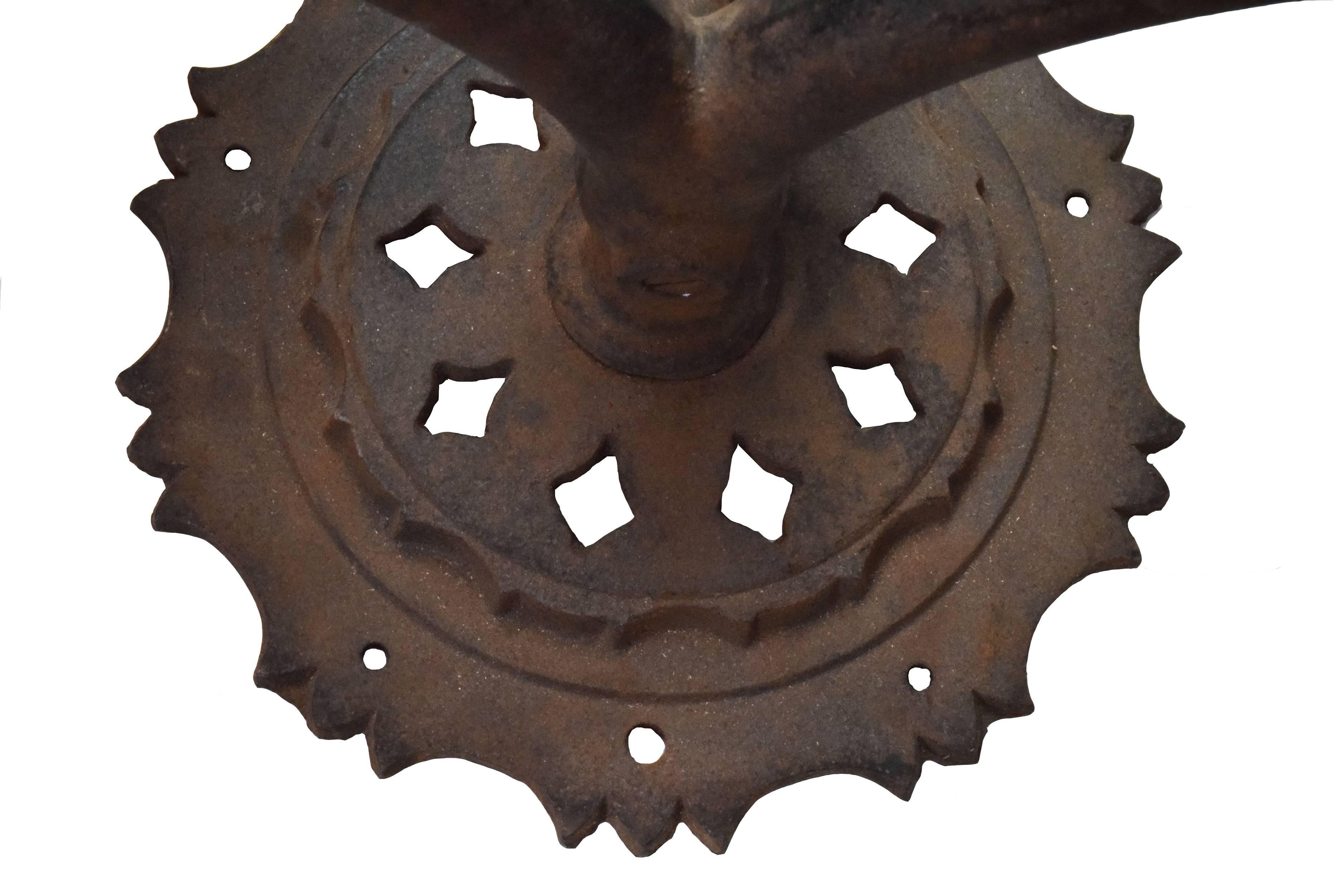 This 1920s iron sconce with prongs will make a statement in your home! A pair of these sconces would look perfect flanking a fireplace or doorway!

Finish: Original
Two medium sockets

We find that early antique lighting was designed as objects of
