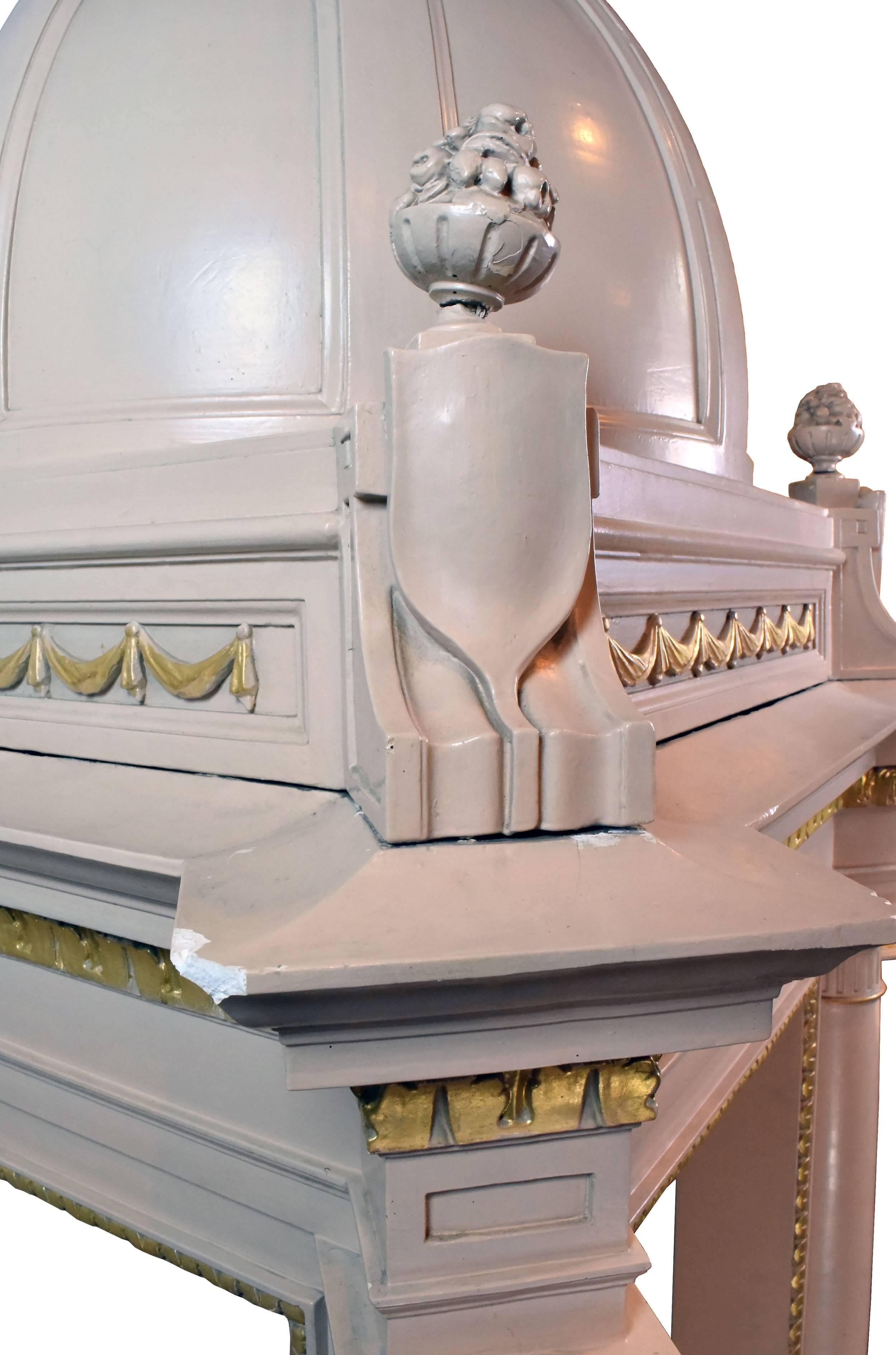 Made entirely of plaster and painted a soft peach color with dazzling gold accents, this baldachino is a sight to behold! Originally used as a freestanding altar canopy in Minneapolis' oldest church, this fixture follows a Classic form. The domed