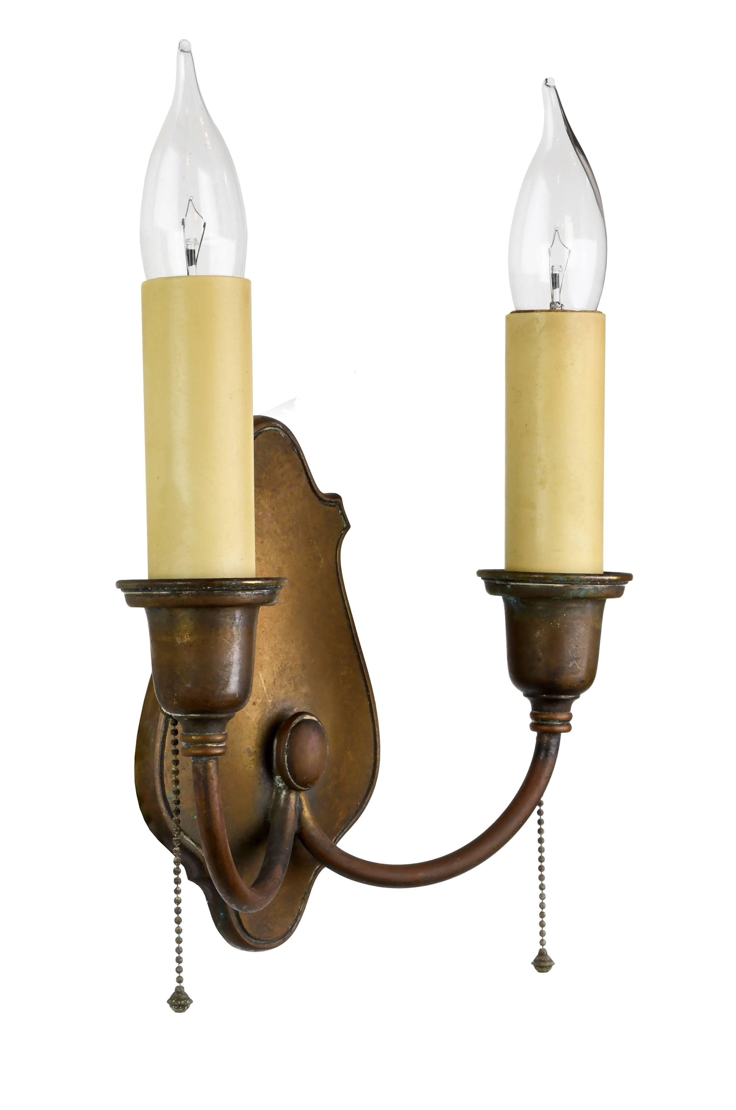 Classic, elegant fixtures, like these Bradley & Hubbard sconces, never go out style. The heavy cast brass and simple, clean lines will accentuate, but not overpower, their surroundings.