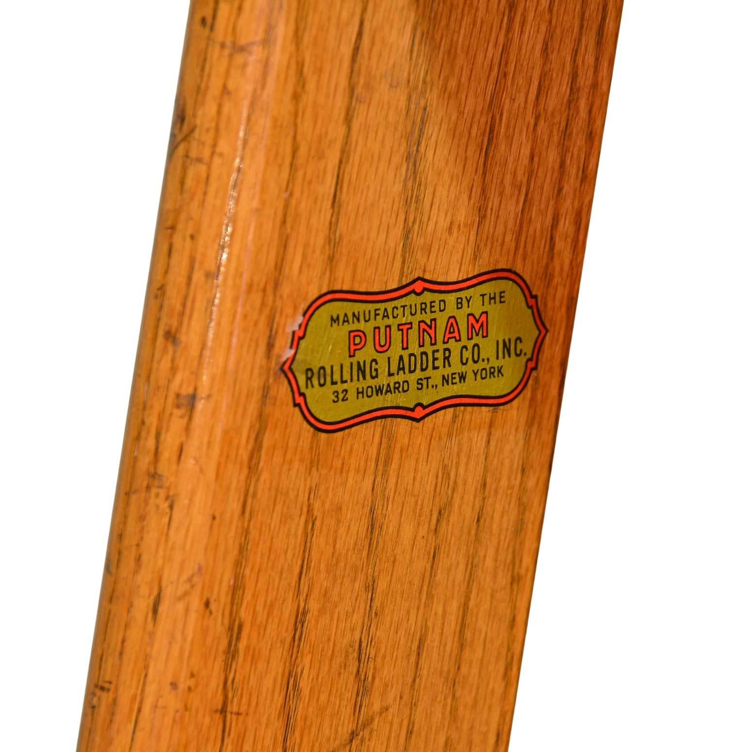 These 11 foot rolling oak library ladders come complete with mounting hardware and decorative brass bottom wheel covers. Manufactured by Putnam Rolling Ladder Co. of NY, who has been making ladders for over 100 years! Perfect for a home library, or