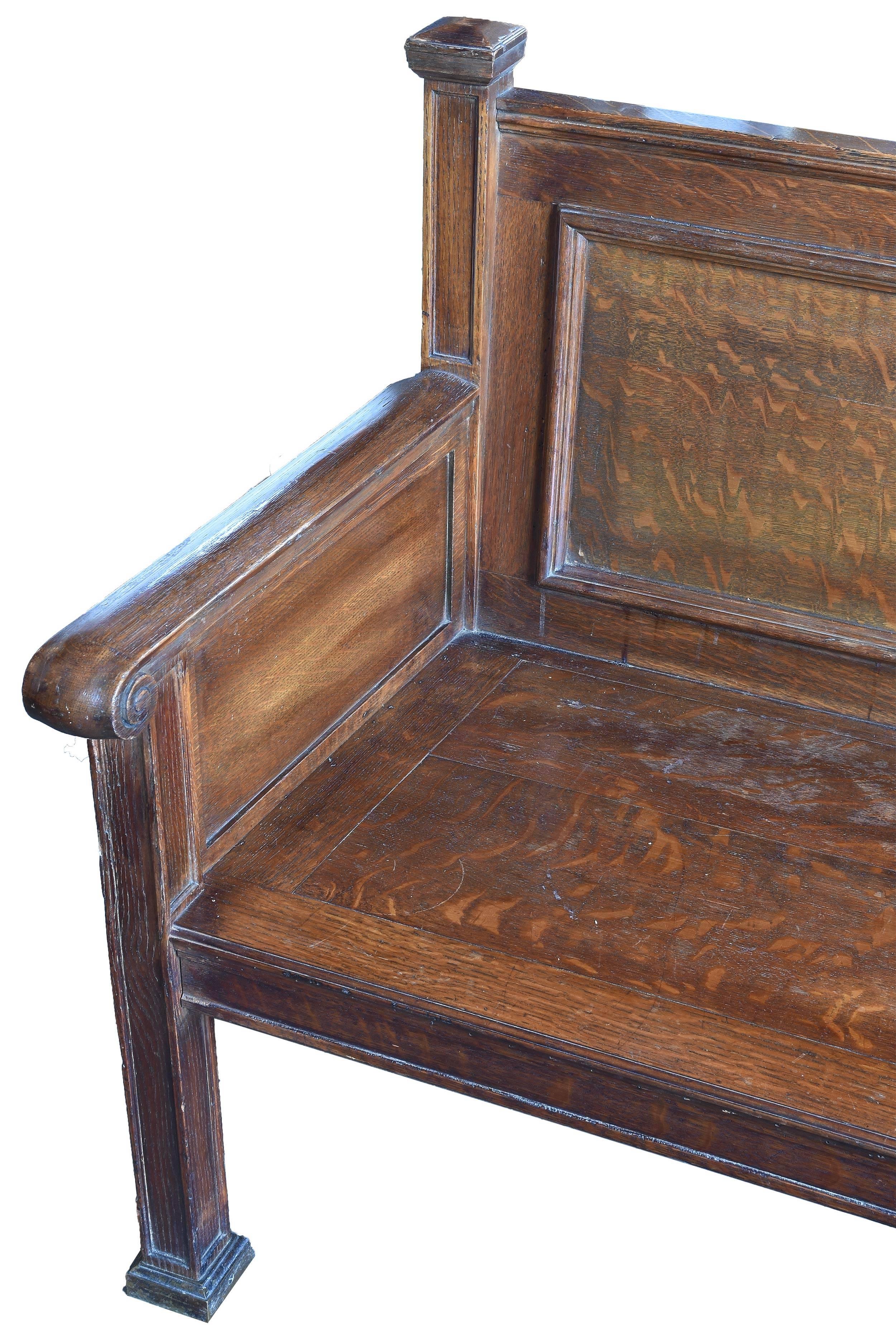 Beautifully chosen quartersawn oak makes this train station bench a seating piece of art. With its inlaid lines and a true craftsman style decorated with slightly flared ends makes this an easy to place and use antique architectural element.

