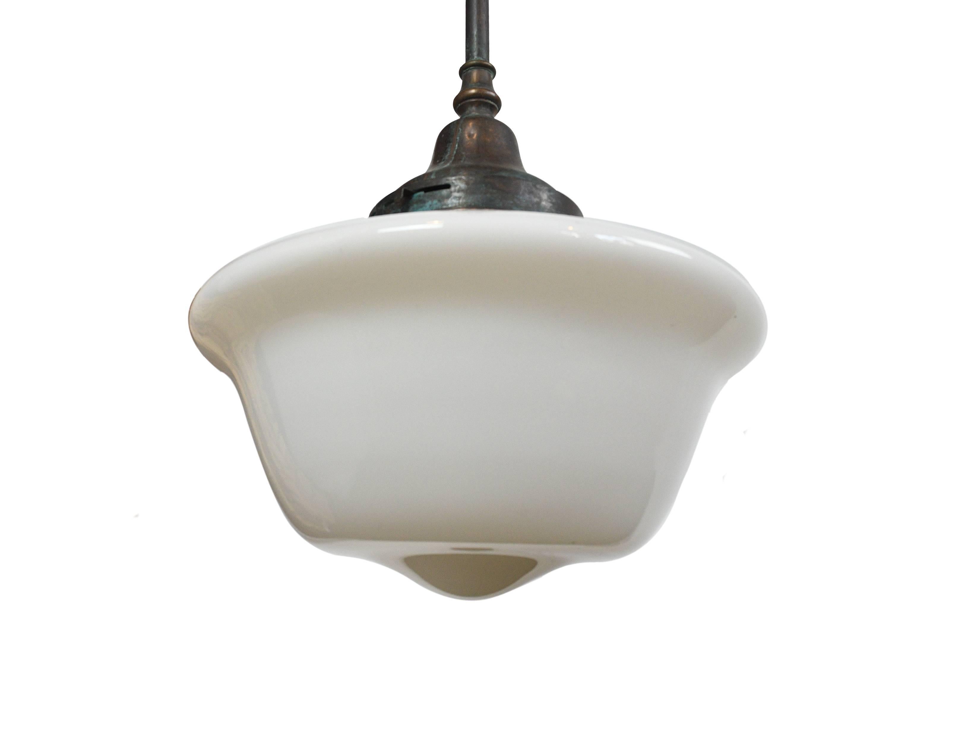 This Classic schoolhouse pendant would look right at home over a kitchen island, or as an accent in a room with lofted ceilings. Loved for their timeless good looks and practical light-diffusing shades, schoolhouse fixtures never go out of style.