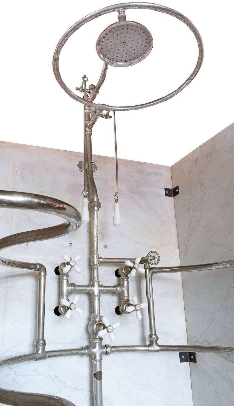 This original Rib Cage Shower Unit is a rare find.  A ‘ribcage’ were generally only found in very upscale homes.    This unit is completely enclosed in Carrara marble, and is designed with multiple sprays to apply jets of water to specific parts of