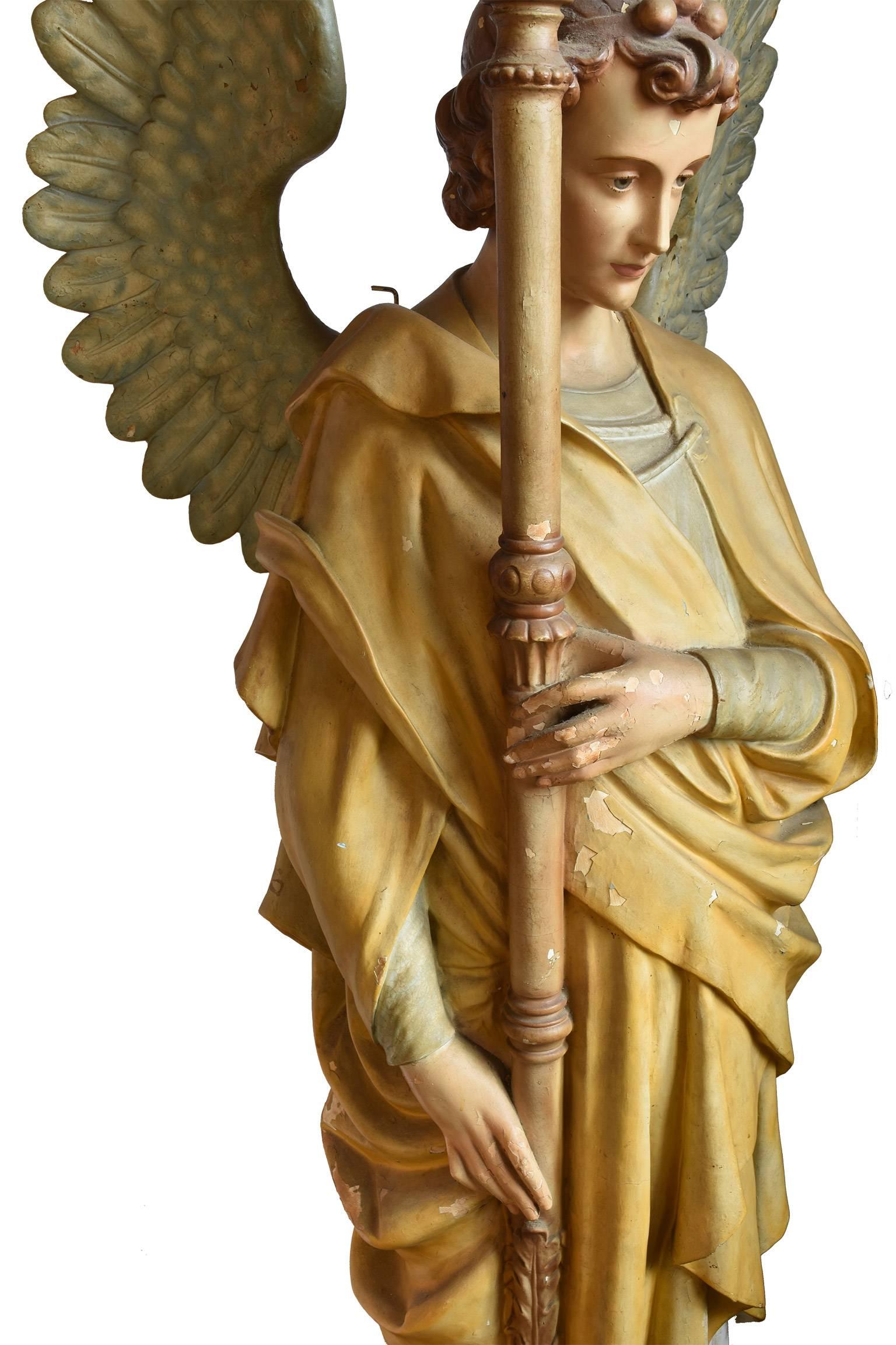 Established in 1860, the Daprato Rigali Studios are international known for the quality and excellence in religious statuary, its founder John Rigali artistically trained in Florence, Italy under Maestro Colgnori.  This winged angel, circa 1920 is