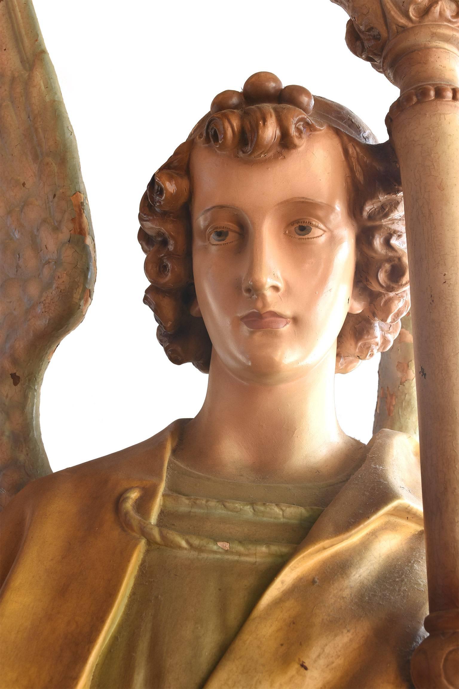 angel holding torch