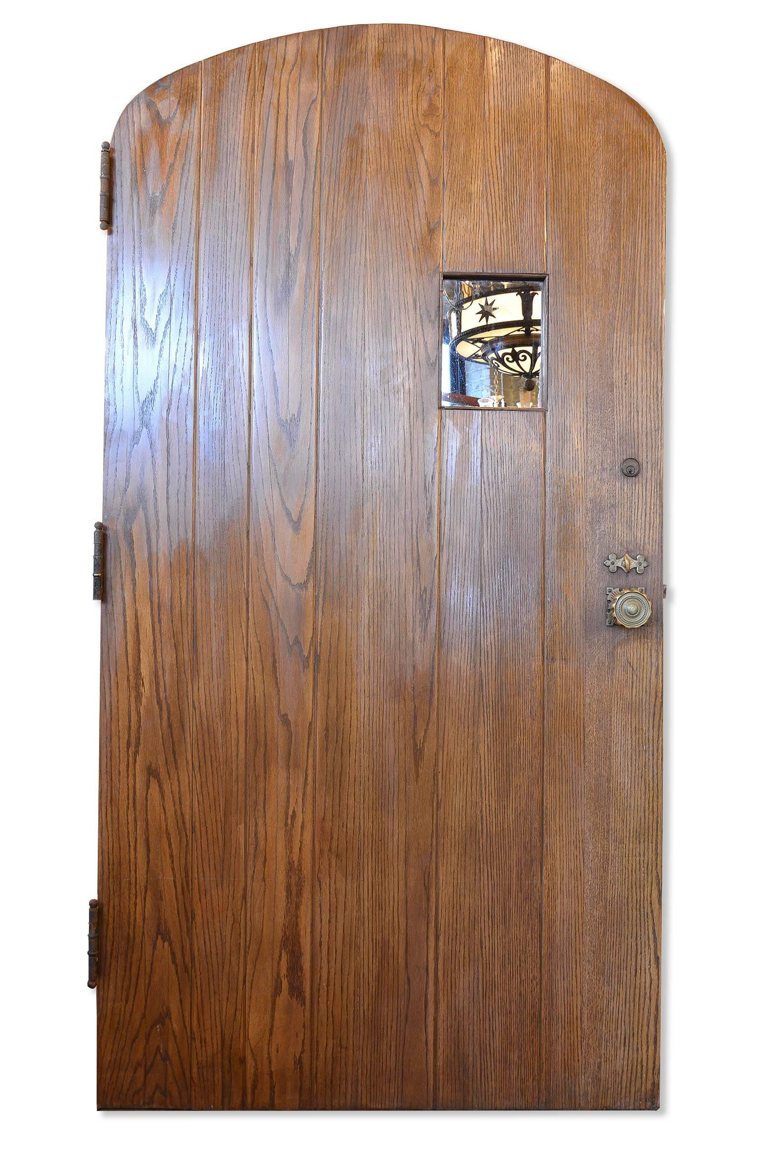Rescued from a 1920s home outside of Chicago, this wonderful oak entry door features a rich original wood finish and amazing cast brass/nickel plated strap hinges and entry knob set that is truly one of a kind.  Strap hinges are ornamental and