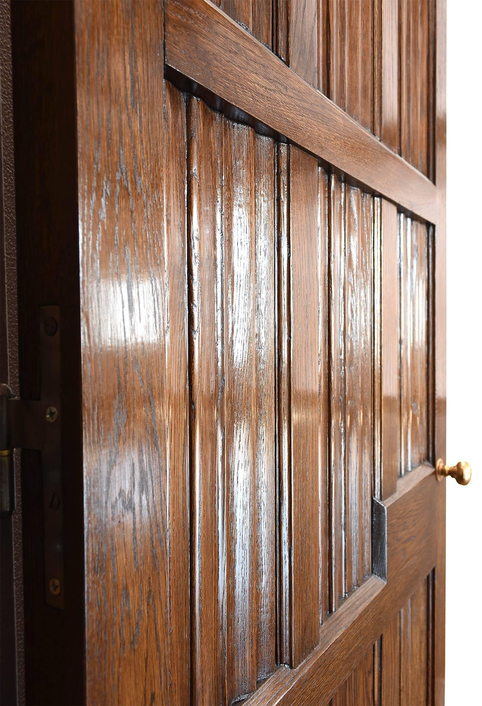 Rescued from a 1920s home designed by architect Ernest Grunsfeld, these linen fold doors are immaculate in condition and substantial in construction. Each door is 2 ¼” thick with the linen fold pattern on each side. The doors included their original