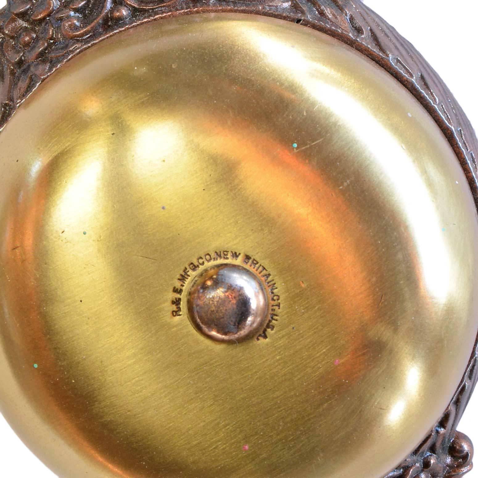 This classic Victorian twist doorbell can add historic charm to any entrance. A mix of brass and iron, the body of this rare hardware includes great decorative ornamentation. The bell, stamped 'Russell & Erwin" creates a wonderful,