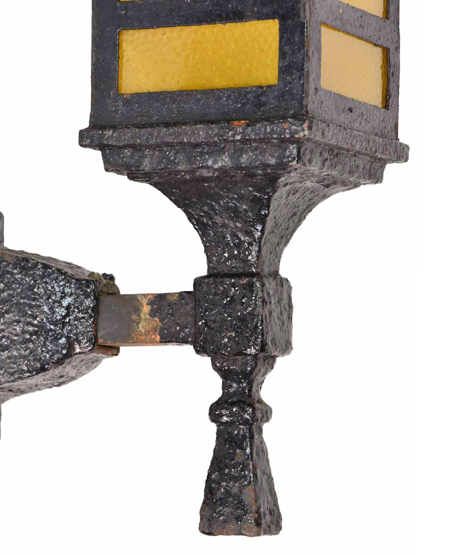 American Original Iron Arts & Crafts Exterior Sconce Pair with Hammered Amber Glass For Sale