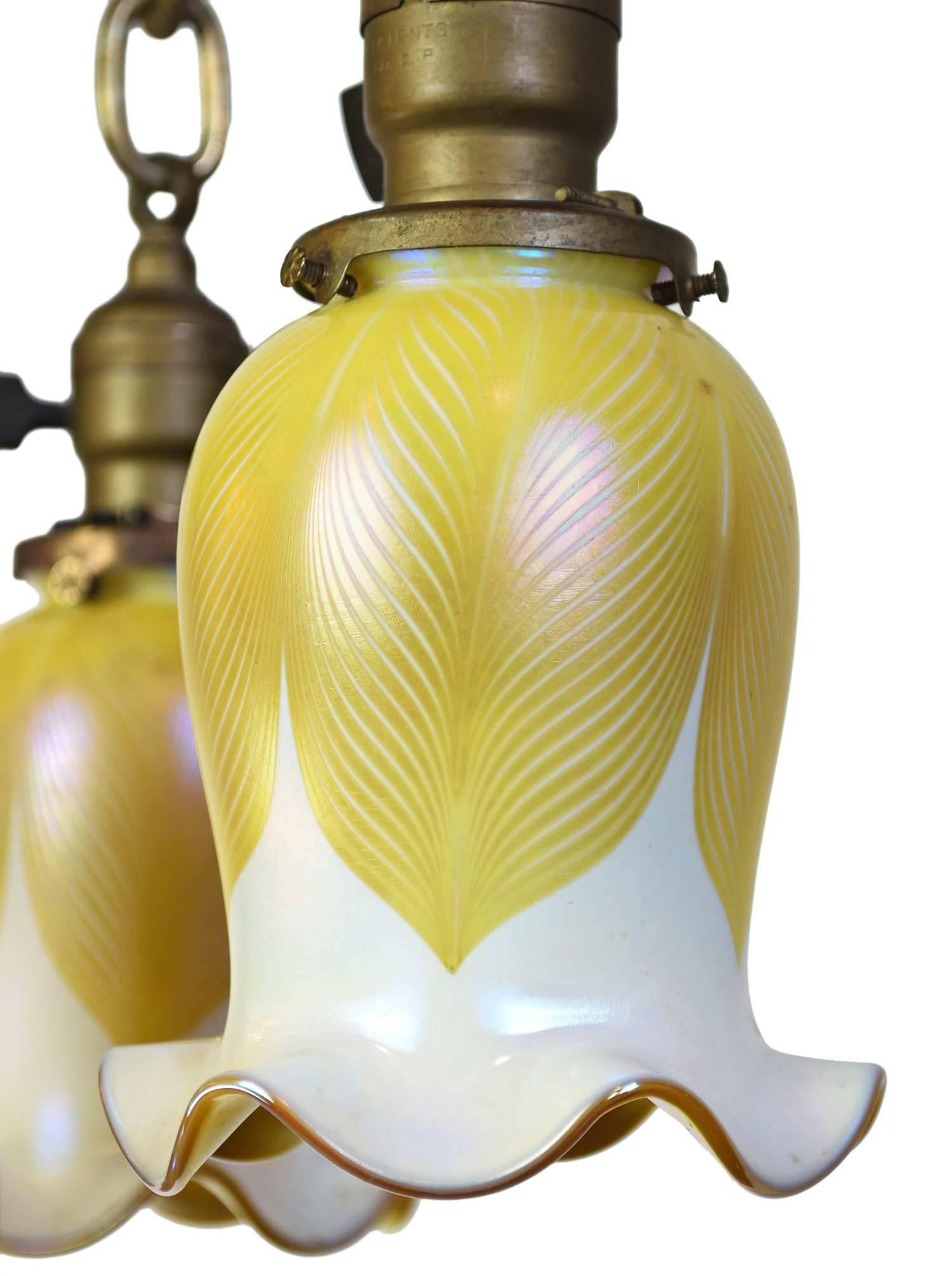 American Stunning Set of Pulled Feather Quezal Shades on Cast Brass Pan Fixture
