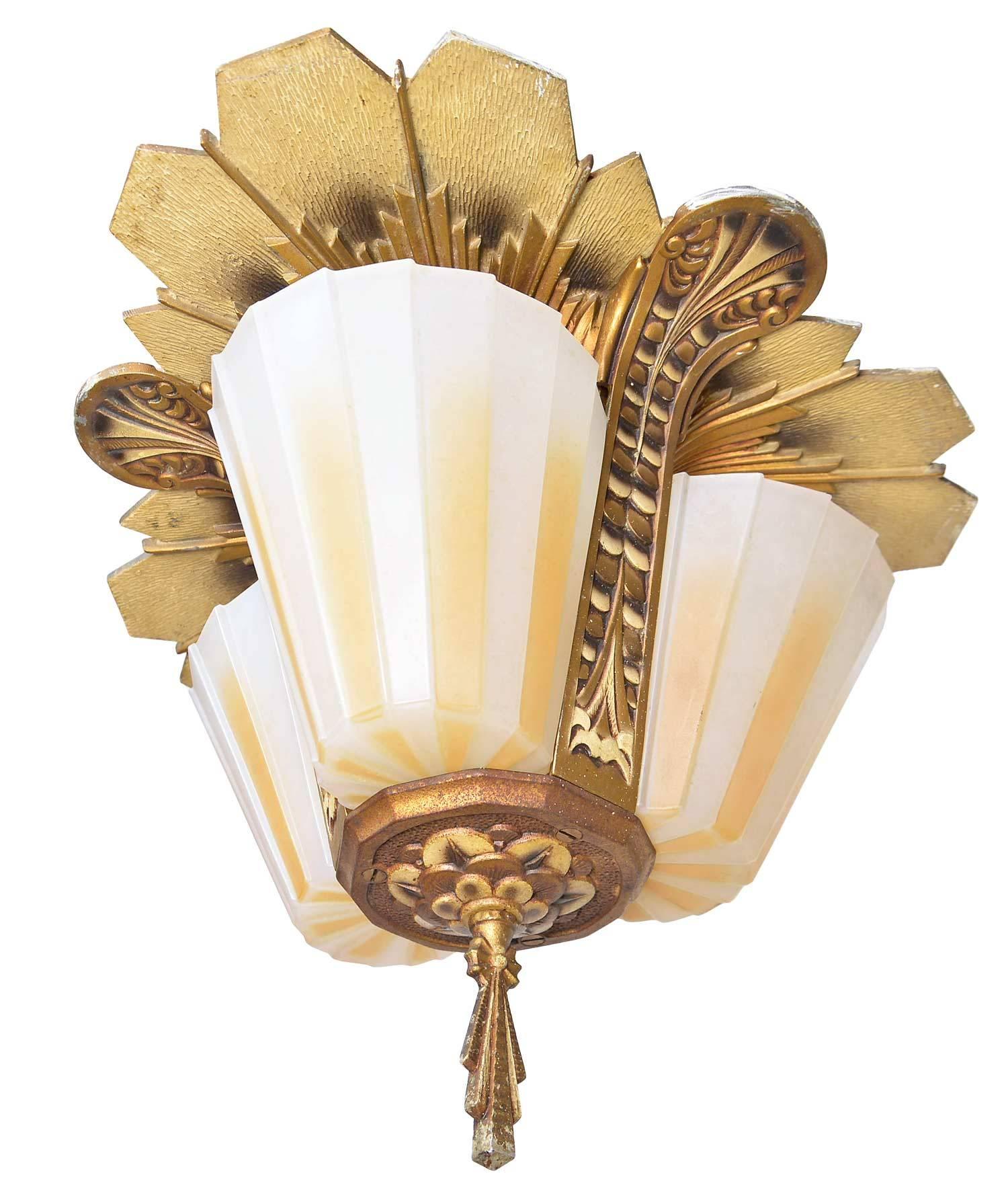 Brass flush mount fixture with art deco details throughout, by Beardslee Manufacturing Co. of Chicago, with three striped slipper shades. Pristine condition with original polychrome paint and signed shades. 


