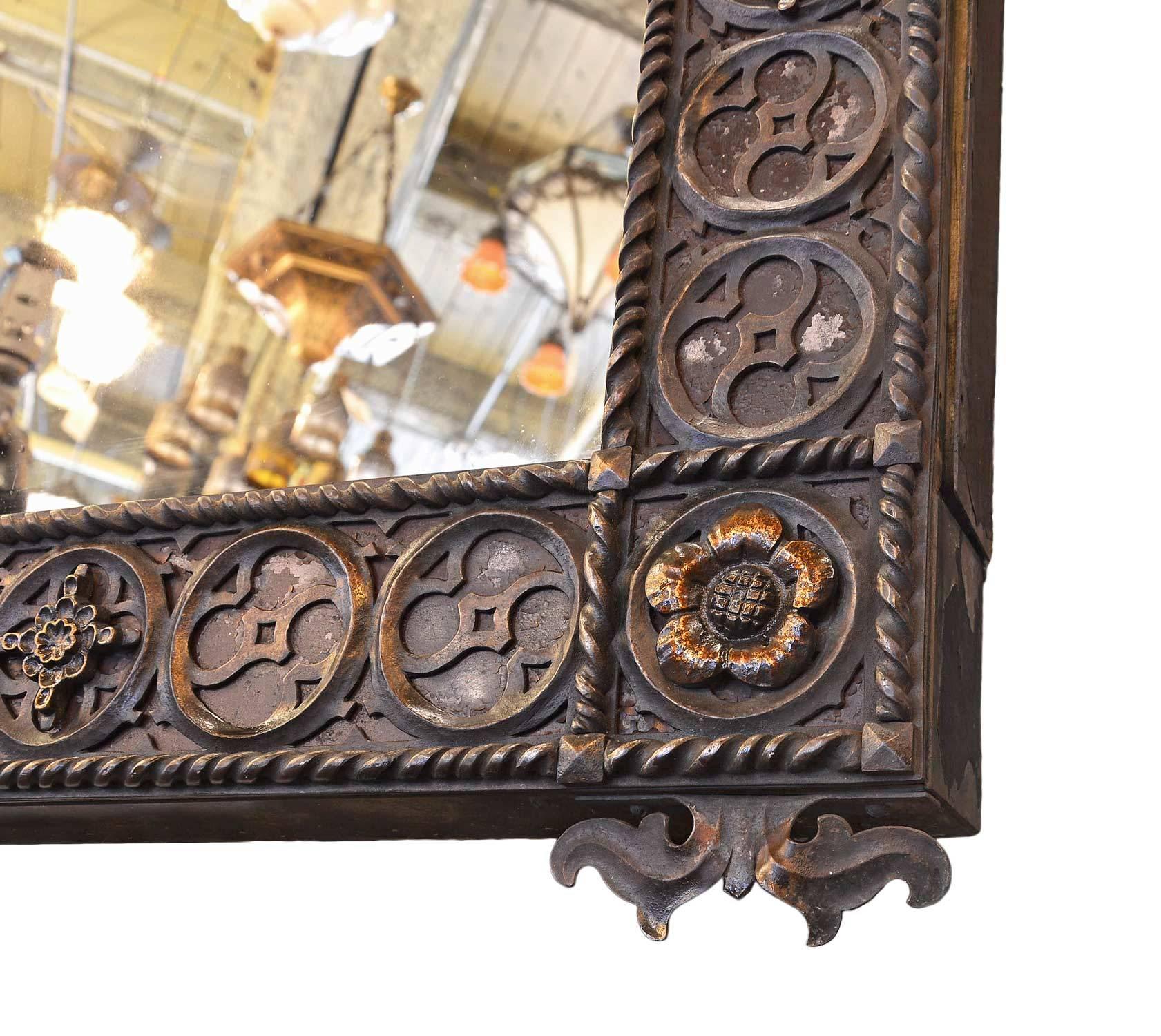 Made by the Frink Corporation of New York, this mirror has a highly decorative iron frame with floral medallions and details that harnesses light to illuminate the reflection. From 1887, I.P. Frink  was revered as ‘among the greatest lighting