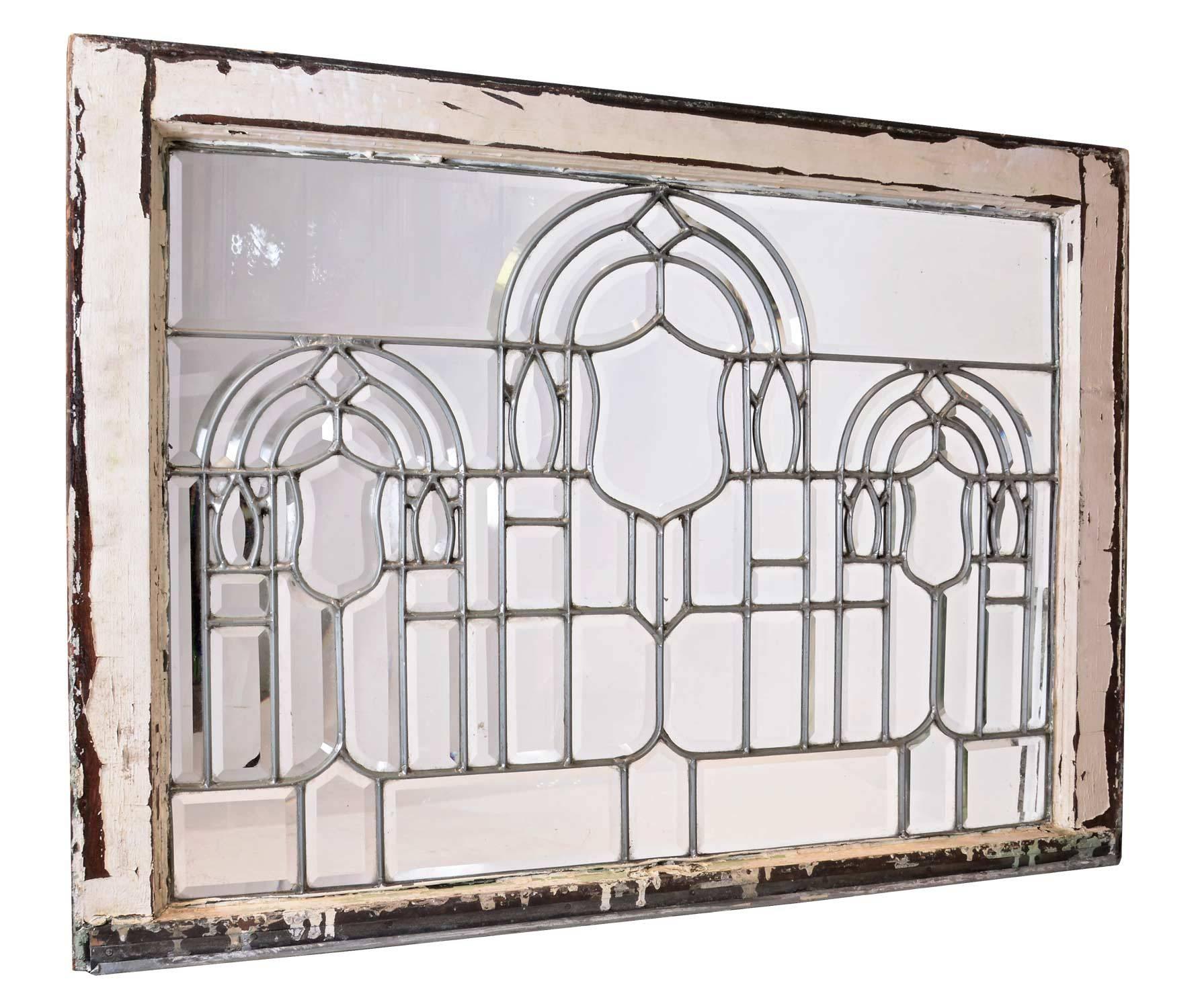 This exquisite set of windows shows a special attention to detail as each glass panel are hand cut bevels, down to the smallest 1/2