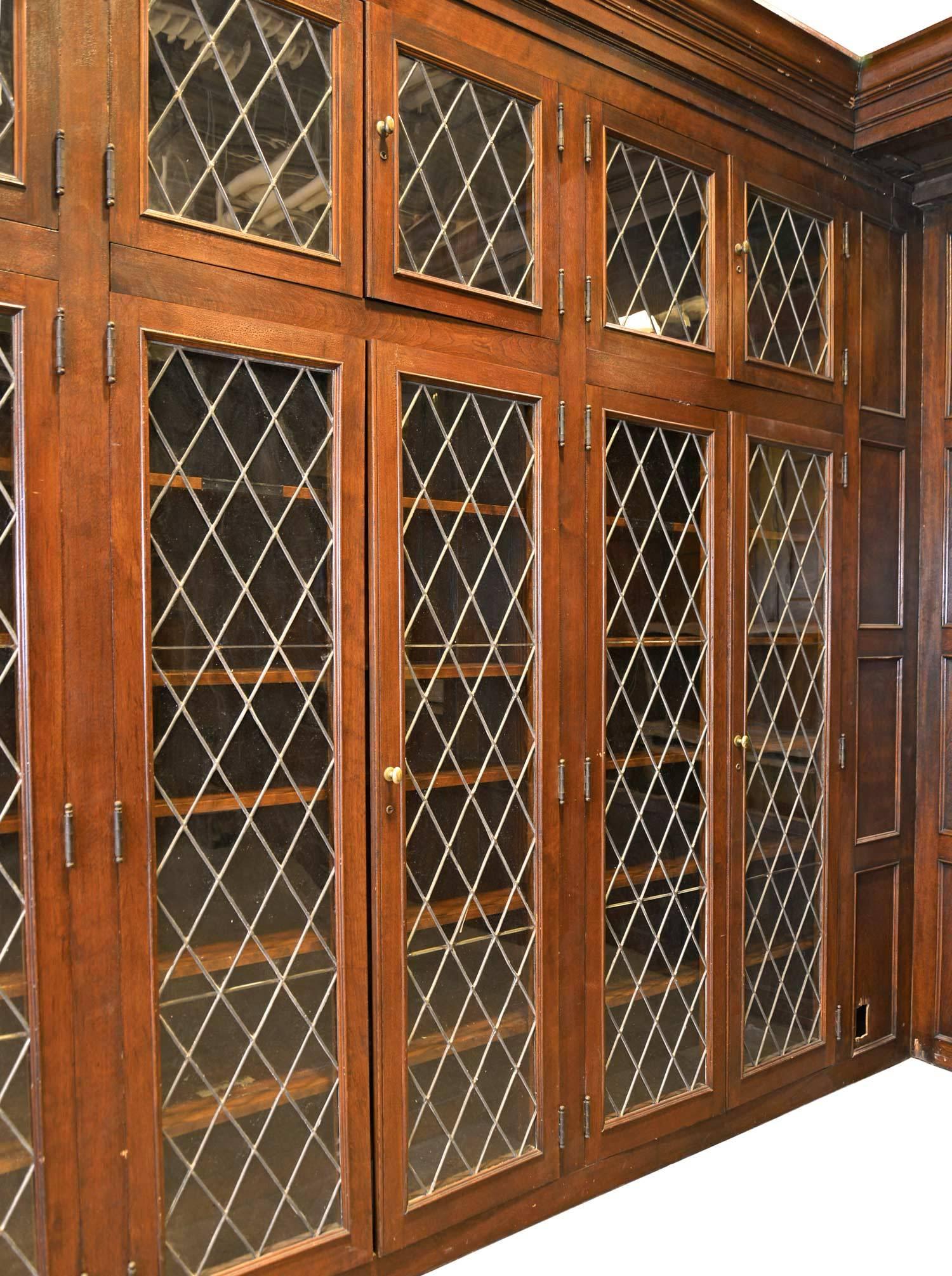 American Complete Walnut Library with Diamond Pane Leaded Glass Doors, circa 1917