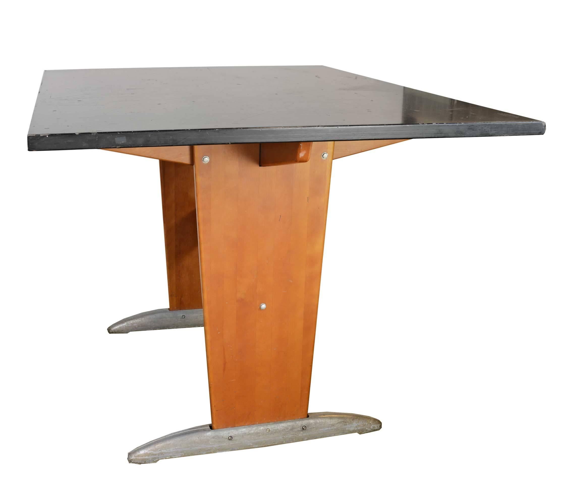 Very mod lab tables with a solid maple wood base, metal hardware, and a black top, just like you may remember from your days as a youth! 

Three matching available.

 