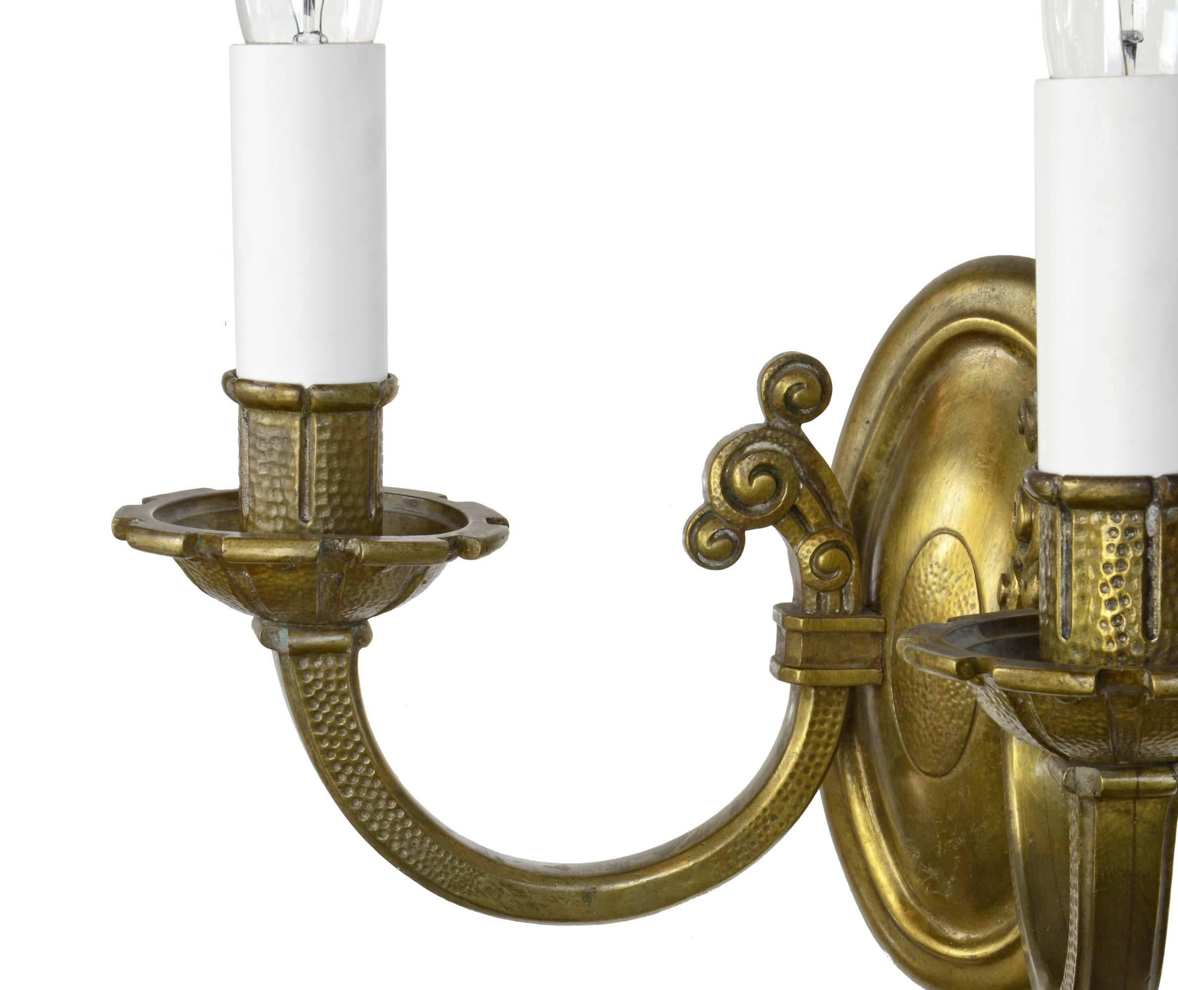 Arts and Crafts Handsome Two-Arm Hammered Cast Brass Sconce For Sale
