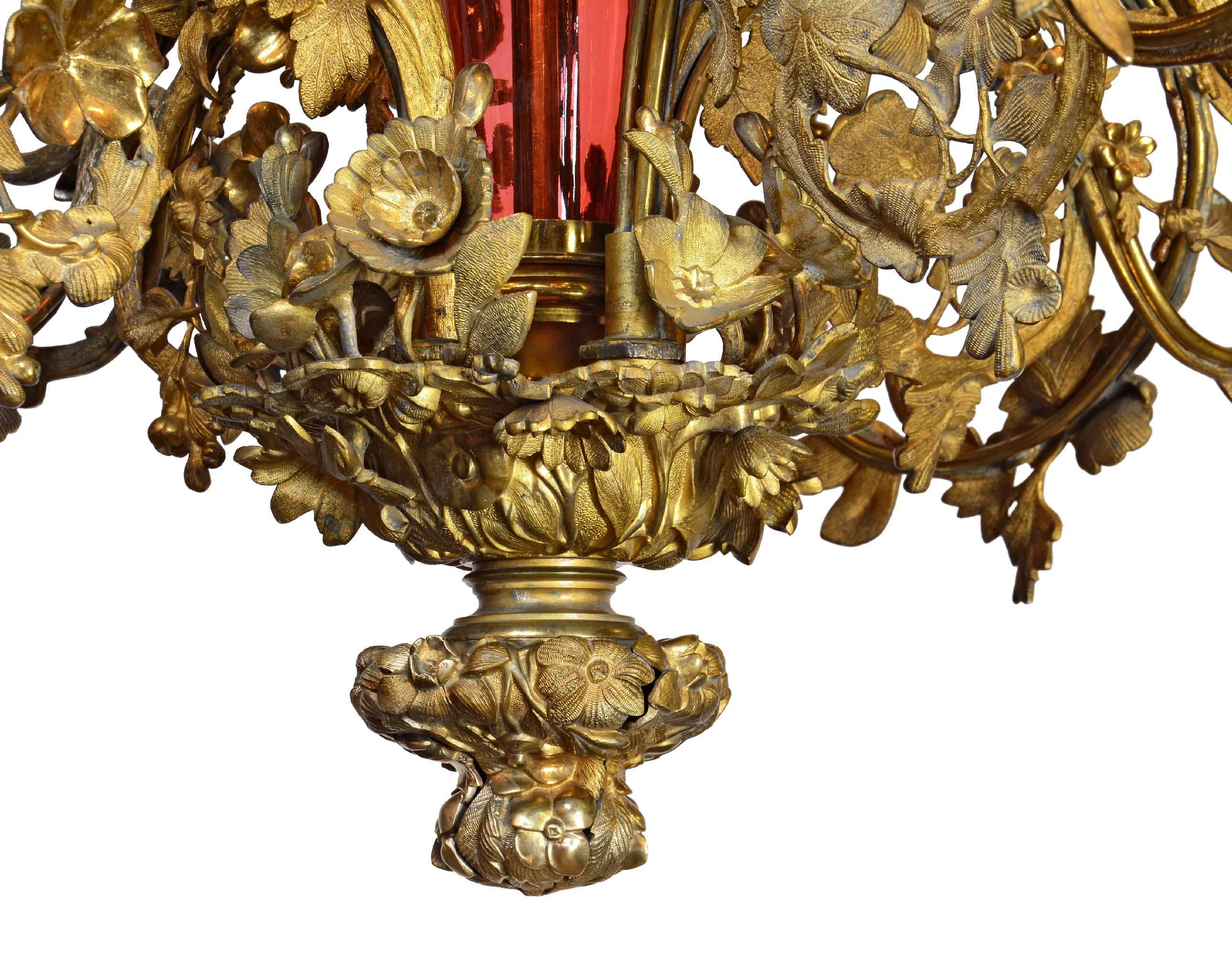 Late 19th Century Ornate Brass and Cranberry Glass Converted Gas Fixture, circa 1880 For Sale