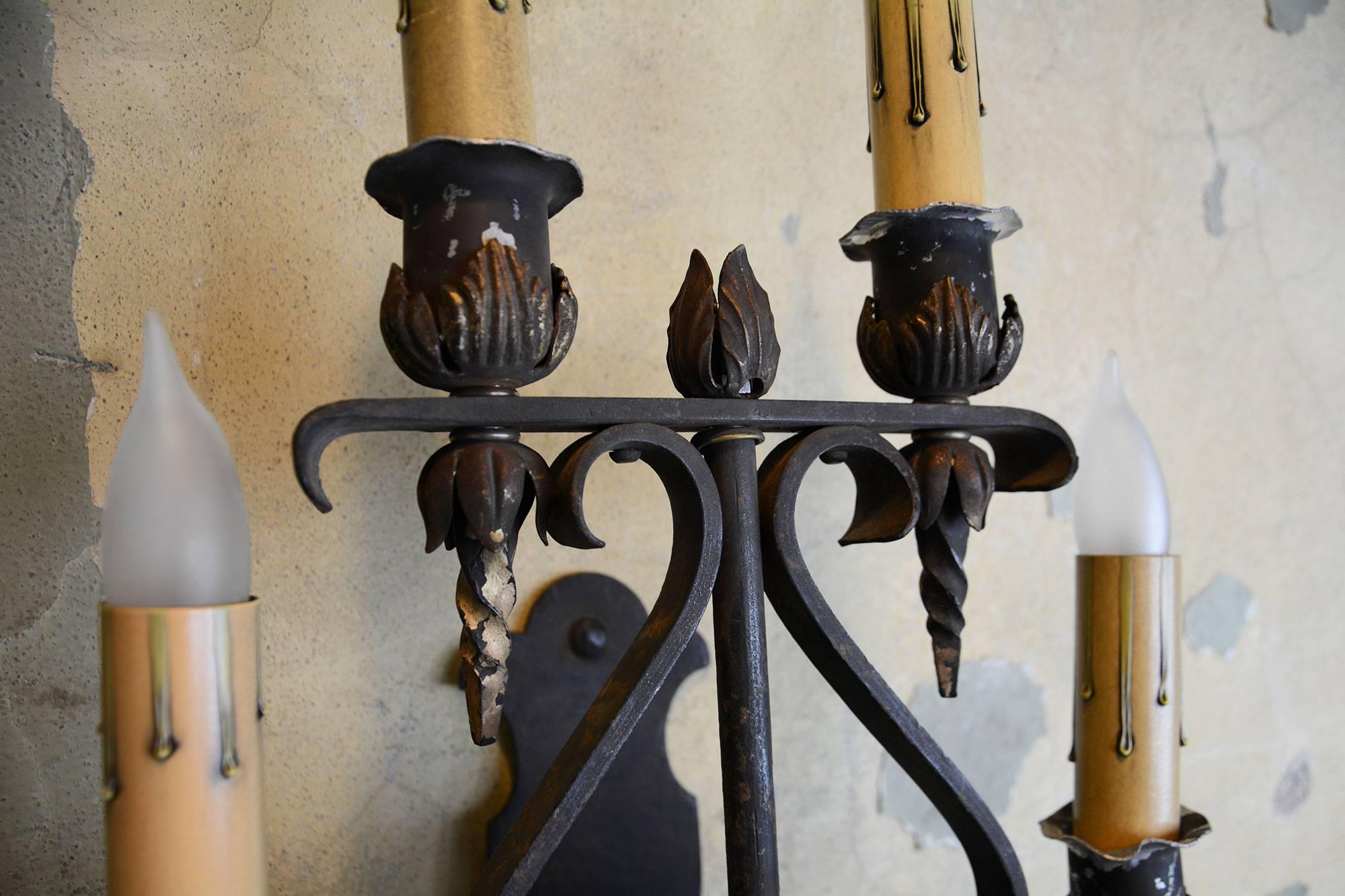 These four candle iron Tudor sconces with brass finials can make your door way bright and elegant. Great details and size with original patina,

circa 1920
Condition: Good
Finish: Original
Country of origin: USA
Measures: 37