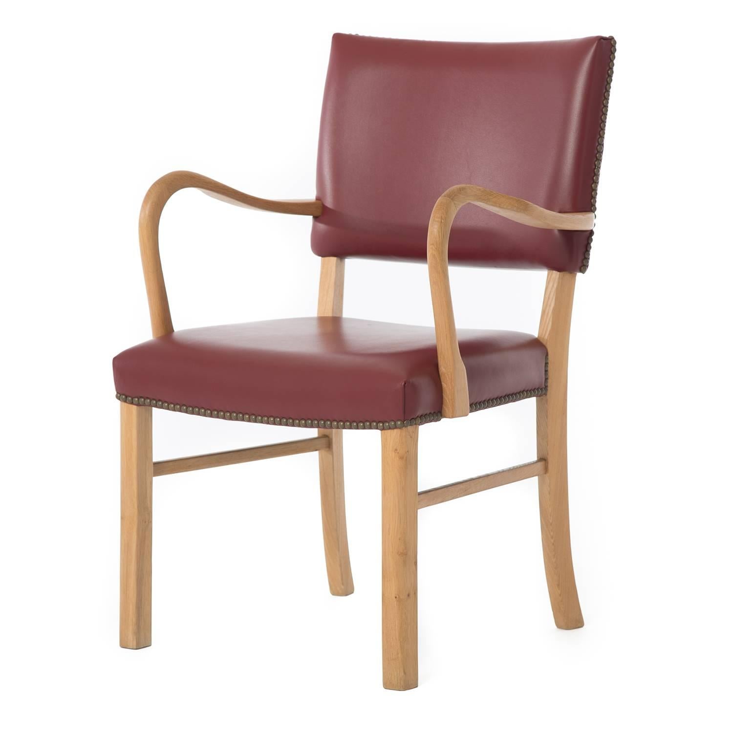 This occasional chair has beautiful bentwood arms that has a look of elegance when viewed from the side. Finished in white oak and leather. 

Professional, skilled furniture restoration is an integral part of what we do every day. Our goal is to