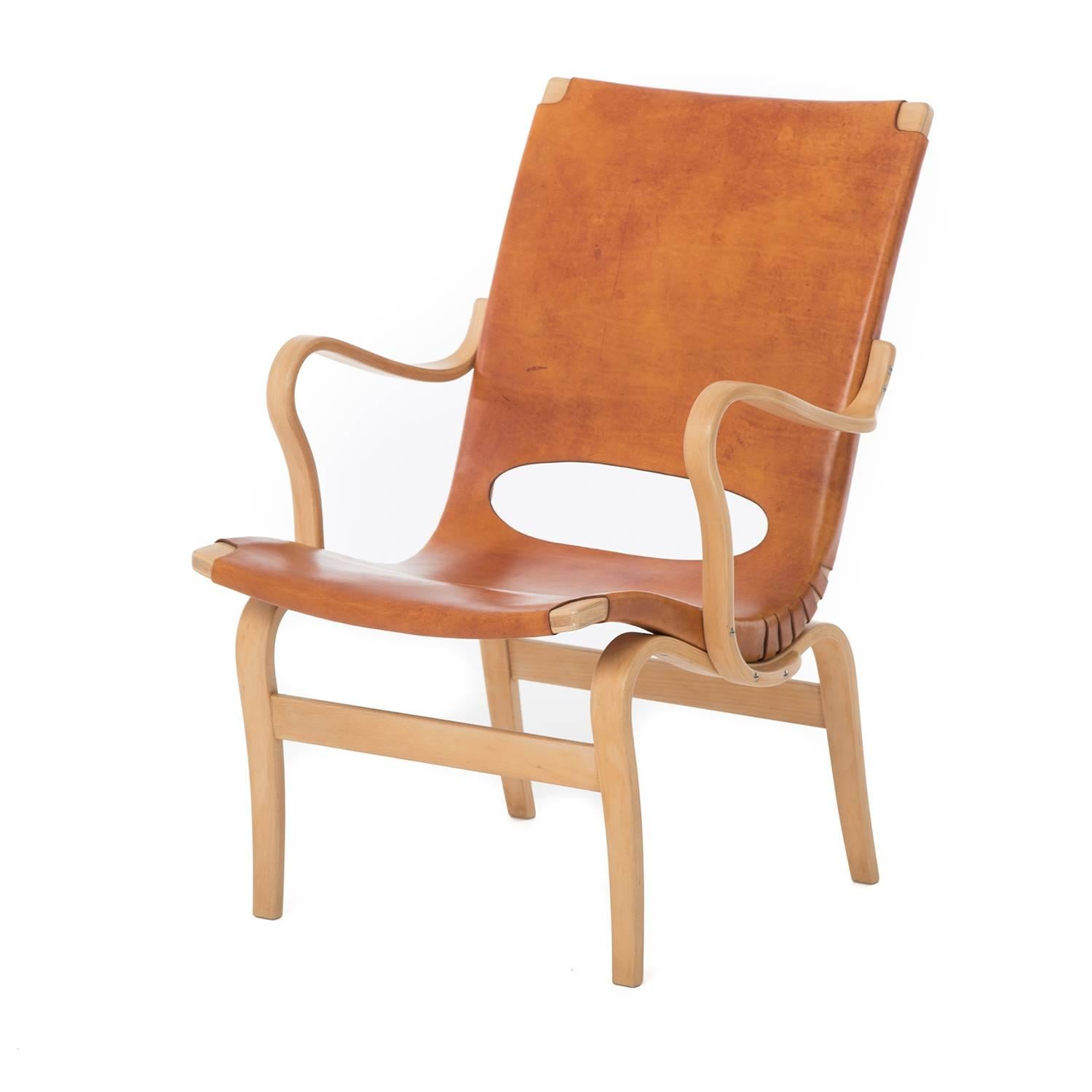 A Classic and lovely design by Bruno Matheson. New hand tanned leather sling seat as per original, completely useable or sitable and easily placeable, adding Classic modernist elegance to any space. 

Professional, skilled furniture restoration is