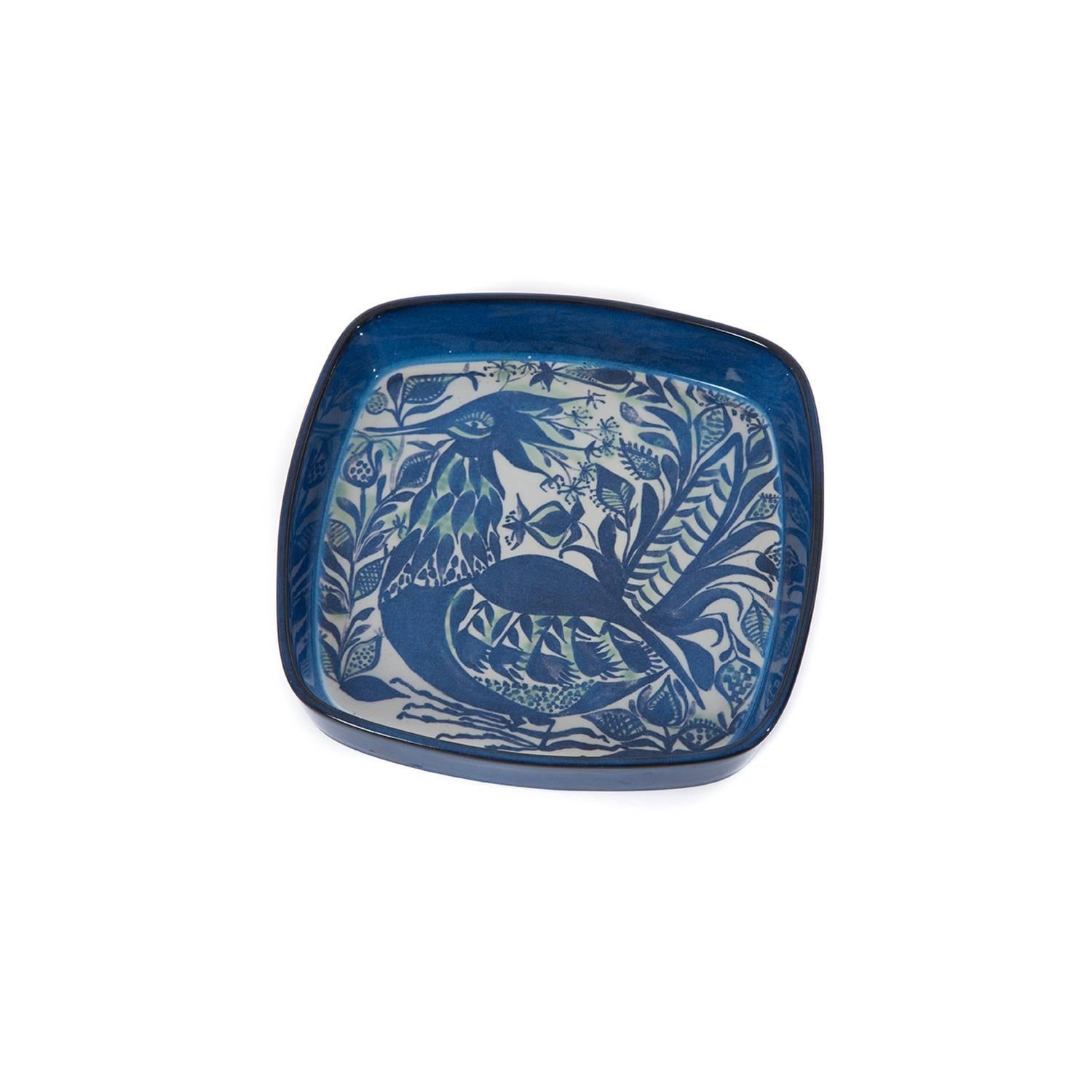 This lovely piece of faience by Royal Copenhagen boasts a hand-painted peacock motif in traditional Danish blue by Marianne Johnson. Perhaps inspired by Tivoli Gardens.