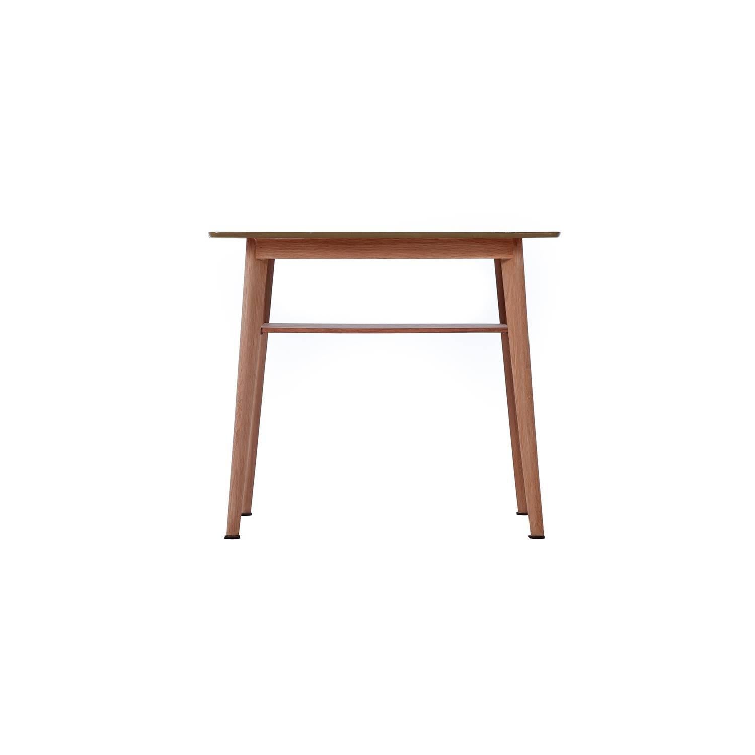 This Danish modern side table features a teak top and shelf offset by oak legs.