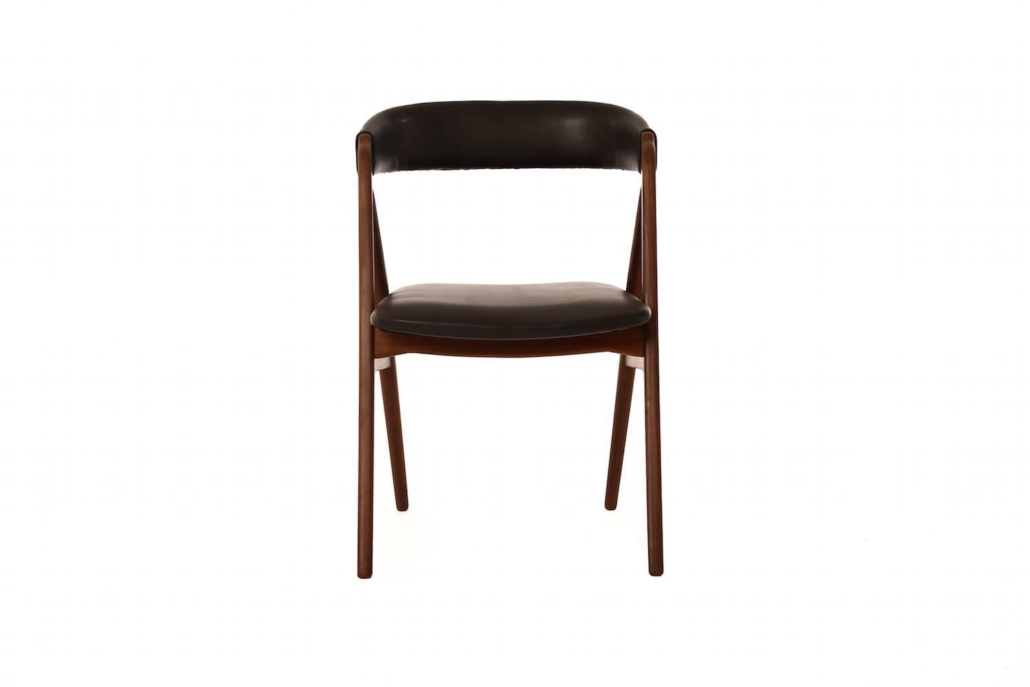 Twelve vintage Danish Modern dining chairs in teak and new recycled leather upholstery. Priced per chair.  Please inquire about set pricing.

Professional, skilled furniture restoration is an integral part of what we do every day. Our goal is to