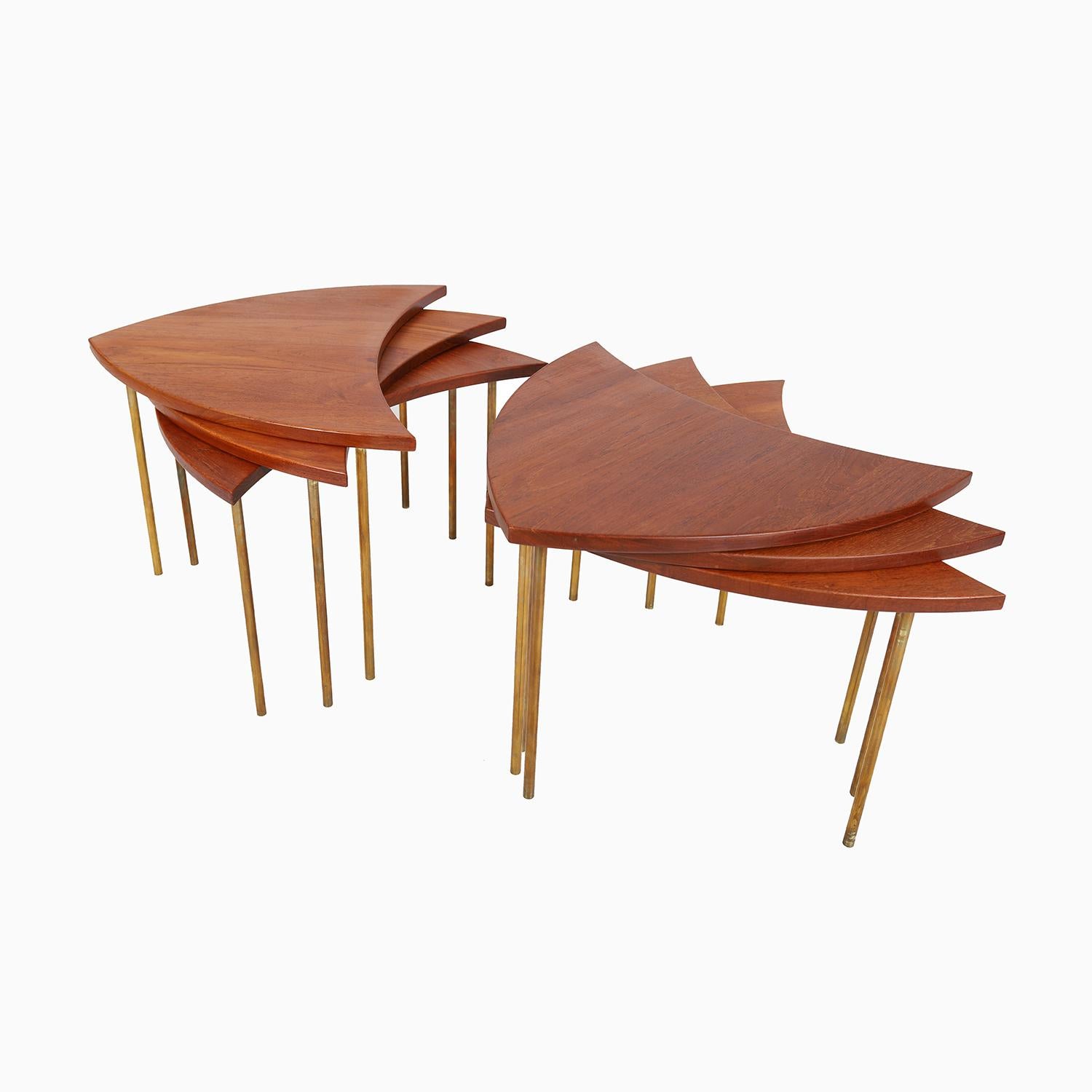 This innovative design by Peter Hvidt and Orla Molgaard is 6 cocktail tables in one coffee table-- arranged in a pinwheel shape this table is 51