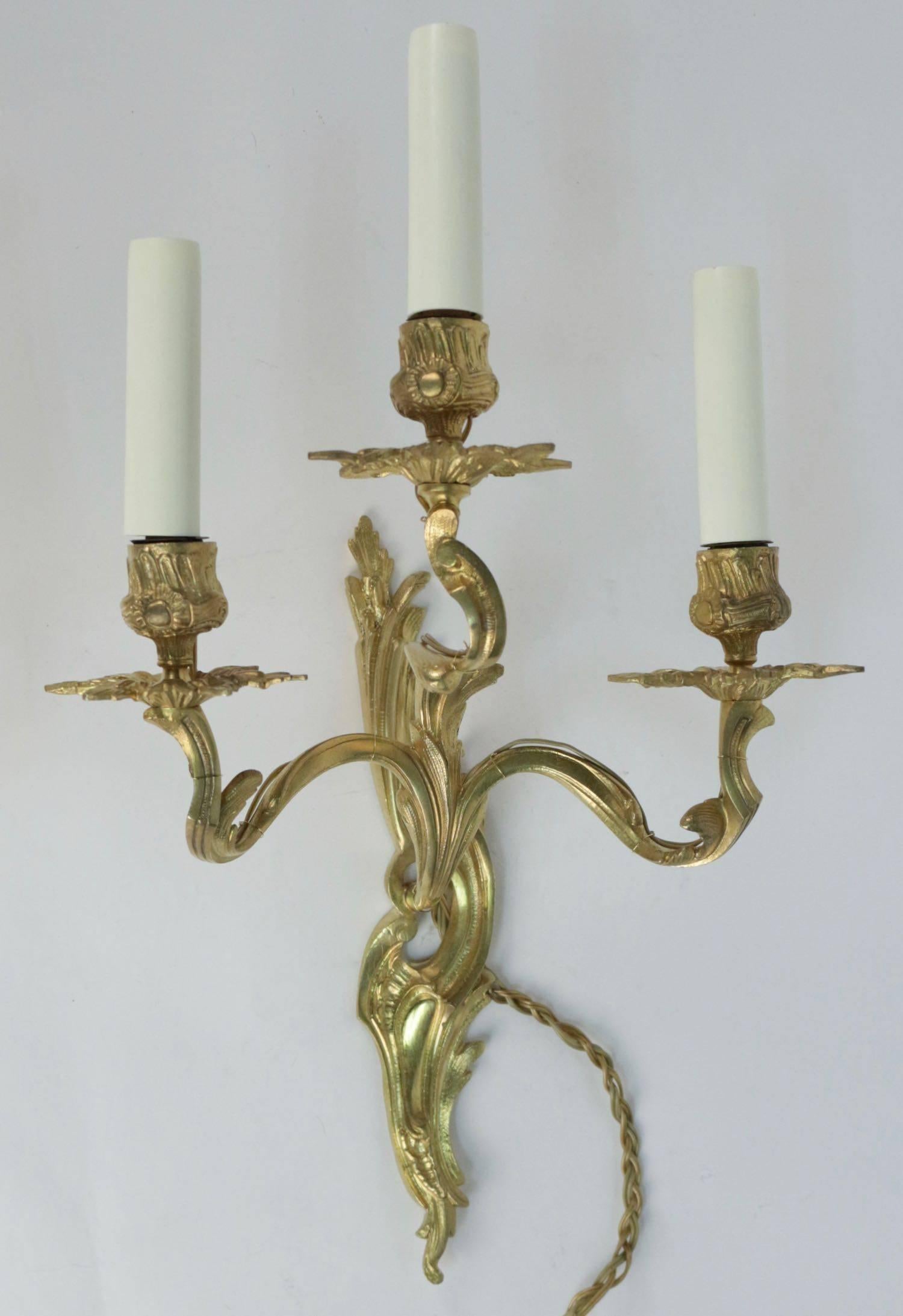 Napoleon III Pair of Louis XV Style Three Armed Sconces in Gold Gilt Bronze