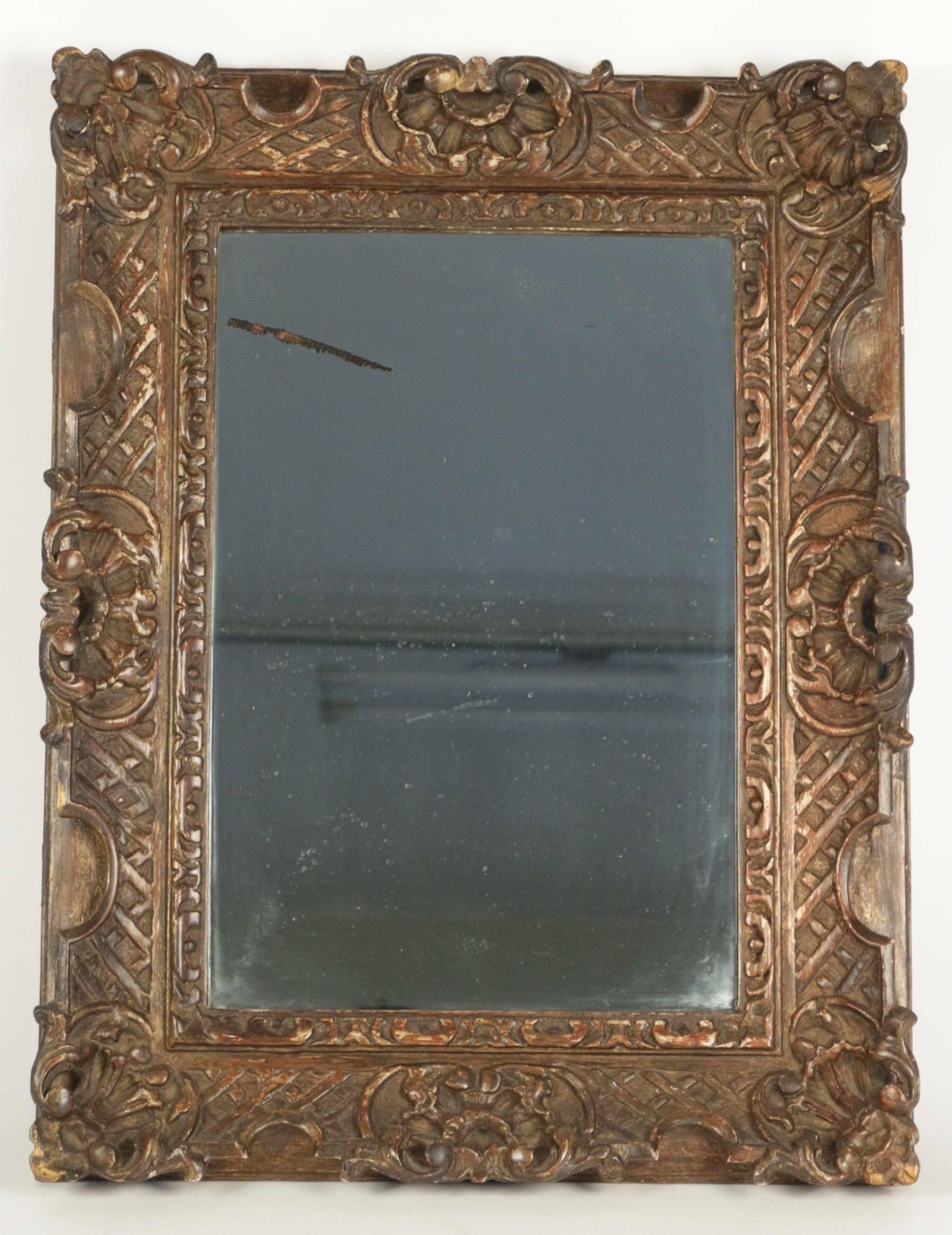Solid wood hand-carved 19th century mirror with original mercury mirror.
     