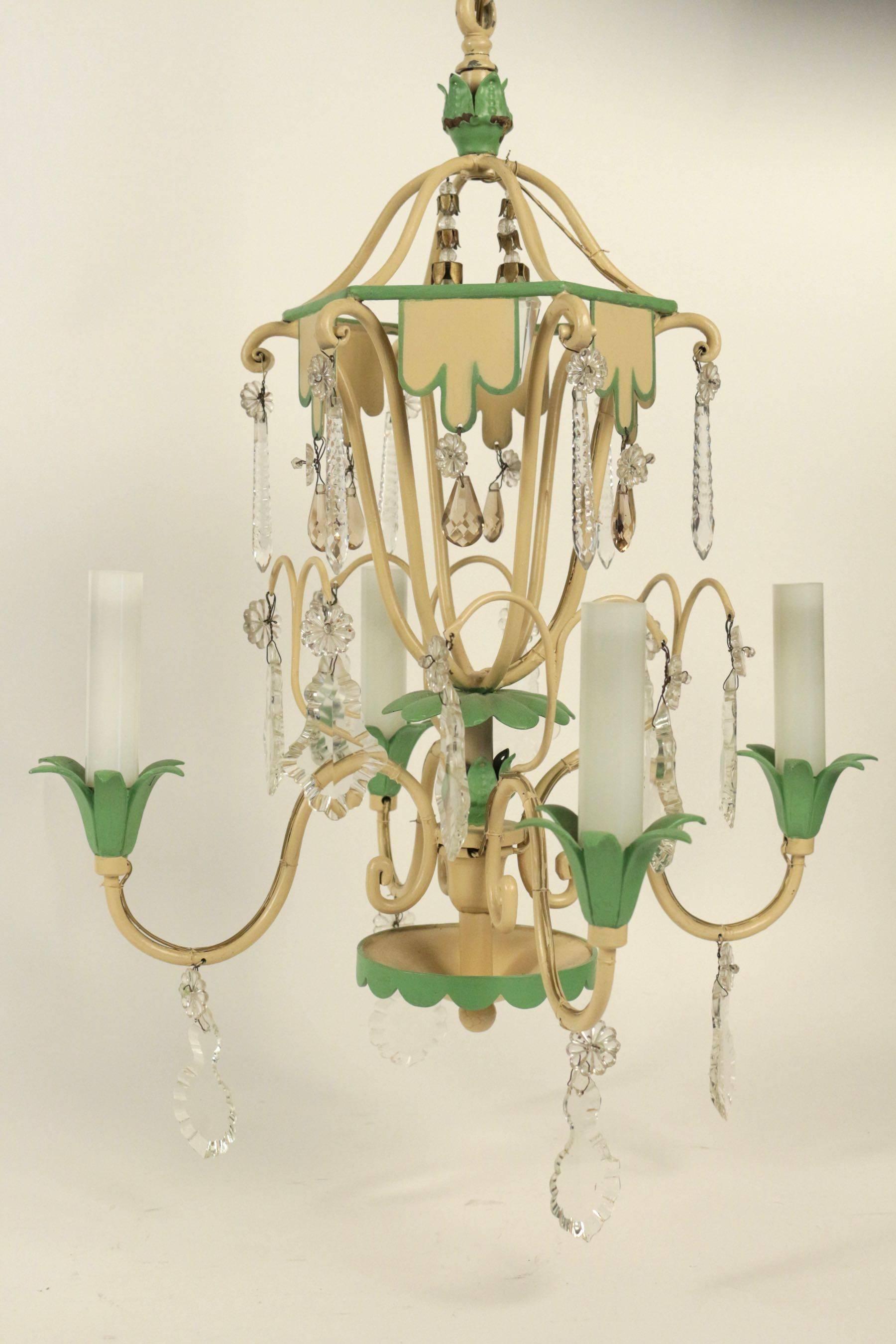 Very pretty small chandelier from the 1950s in painted metals and crystal, with four lights and the candles themselves in opaline.
 