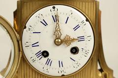 Mantle Clock in Gold Gilt Bronze 19th Century in the Manner of Louis XVI