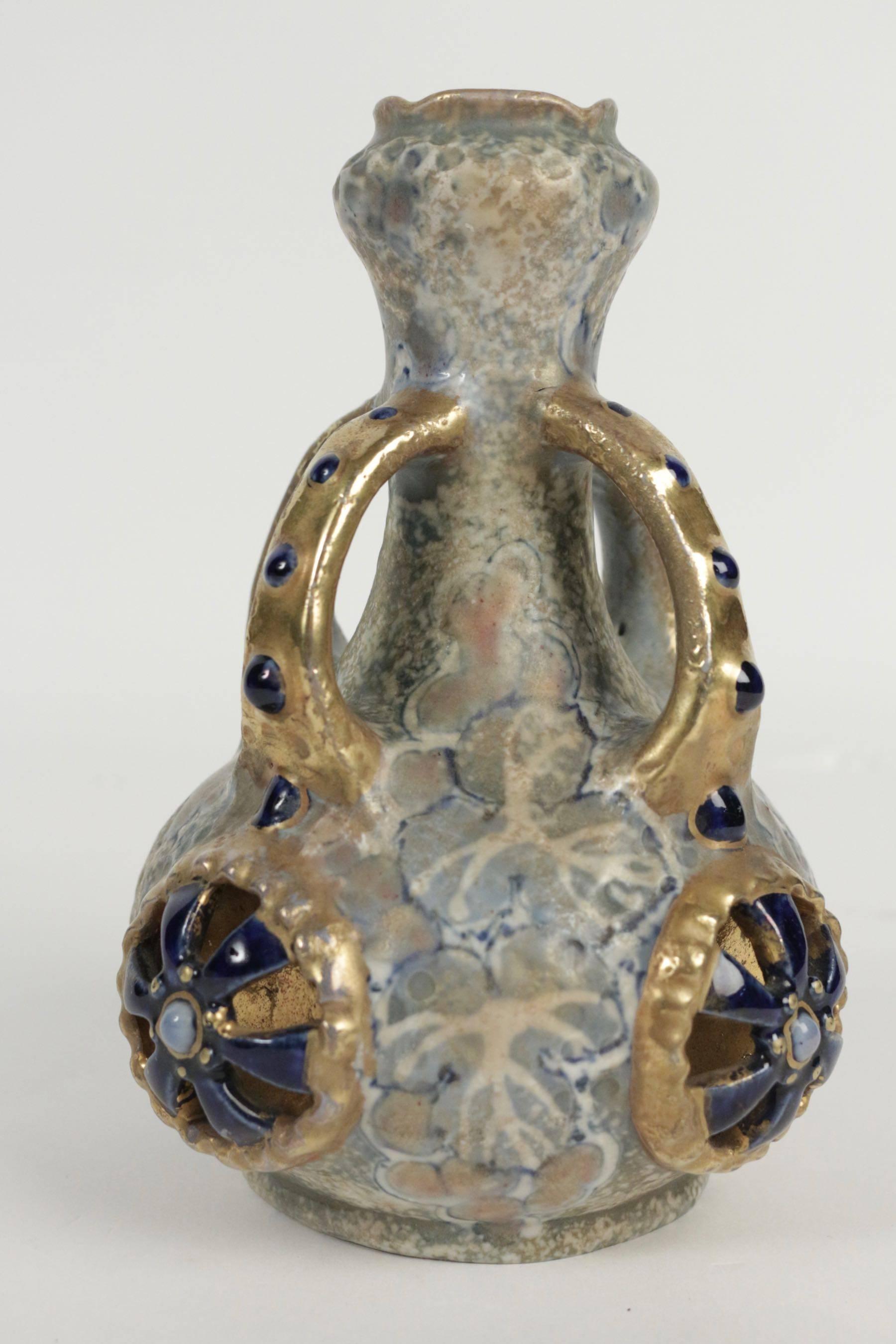 Amphora earthenware shaped vase, Viennese, Austria, from the beginning of the 20th century, circa 1900 with four stylized handles.
 