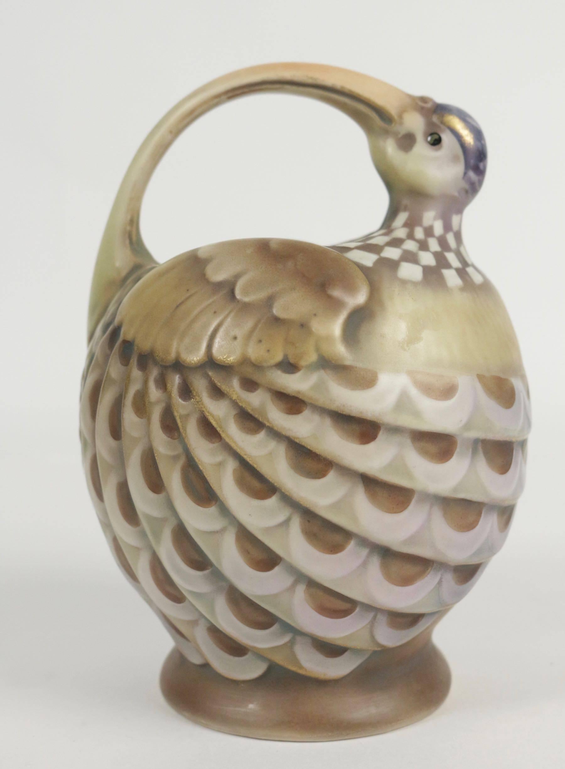 Amphora vase, Viennese, Austria in earthenware from the beginning of the 20th century, circa 1900 with a handle that transforms from a beak to head of a bird.
 