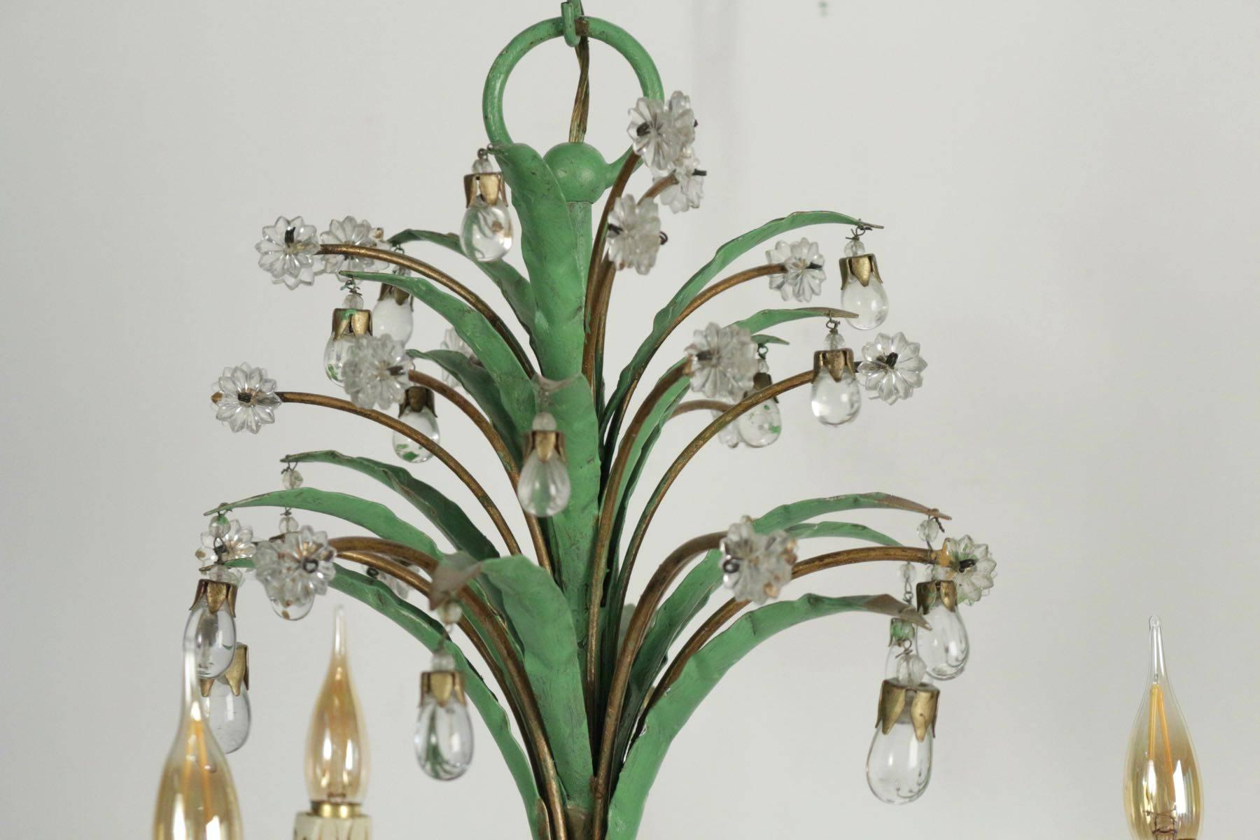 Three-arm chandelier in tole with crystals in glass, circa 1950 in green and gold.
     