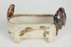 Amphora, a Flower Box with Birds and Decorated with Leaves of an Oak Tree