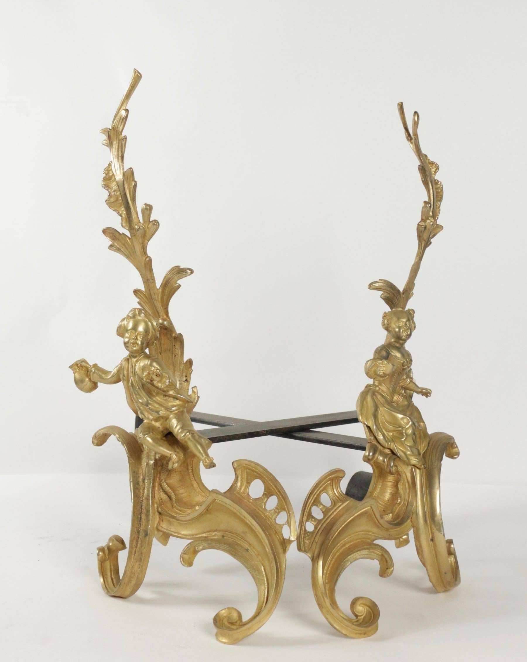 Napoleon III Pair of Louis XV Style Fireplace Irons in Gold Gilt Bronze from the 19th Century