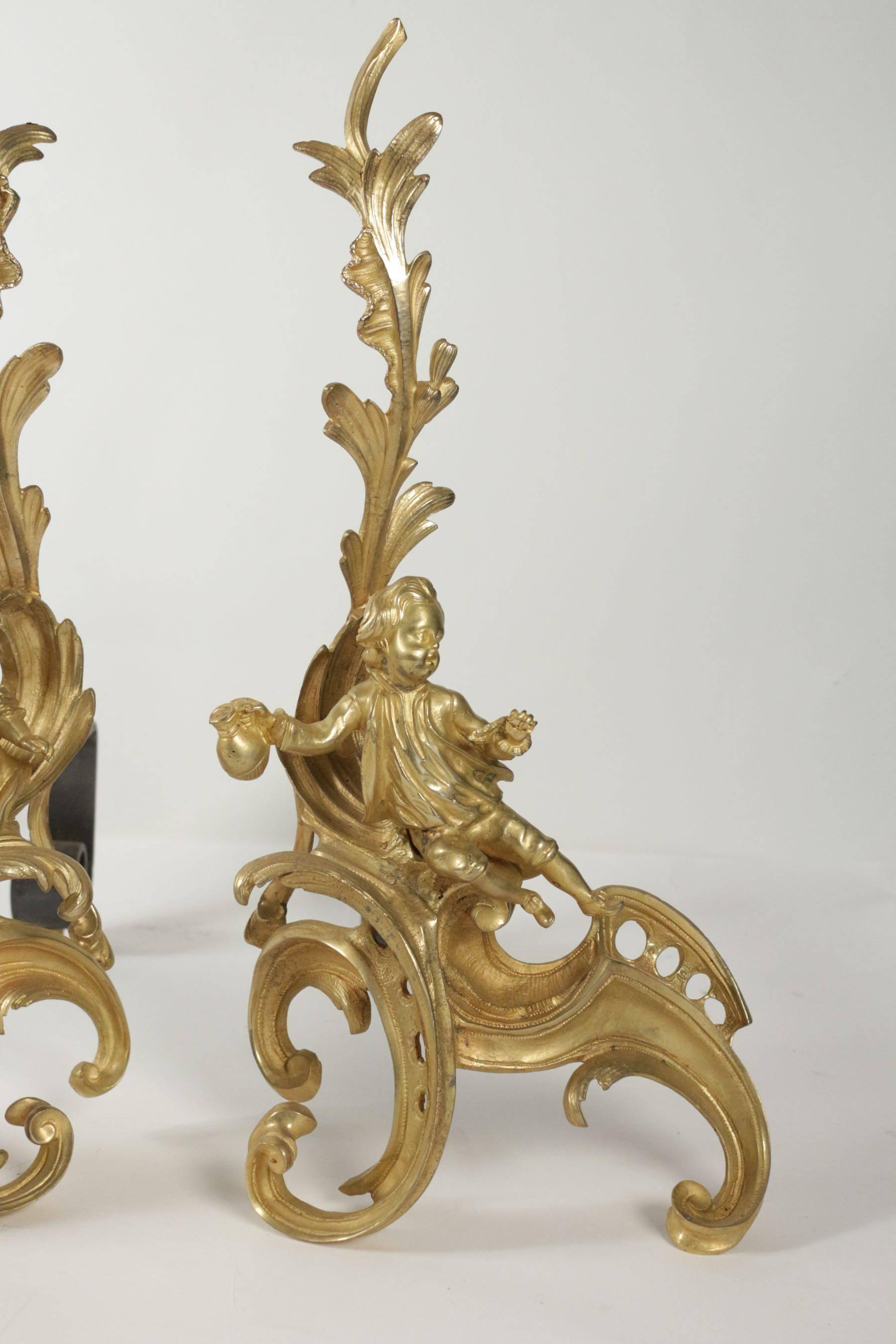 French Pair of Louis XV Style Fireplace Irons in Gold Gilt Bronze from the 19th Century