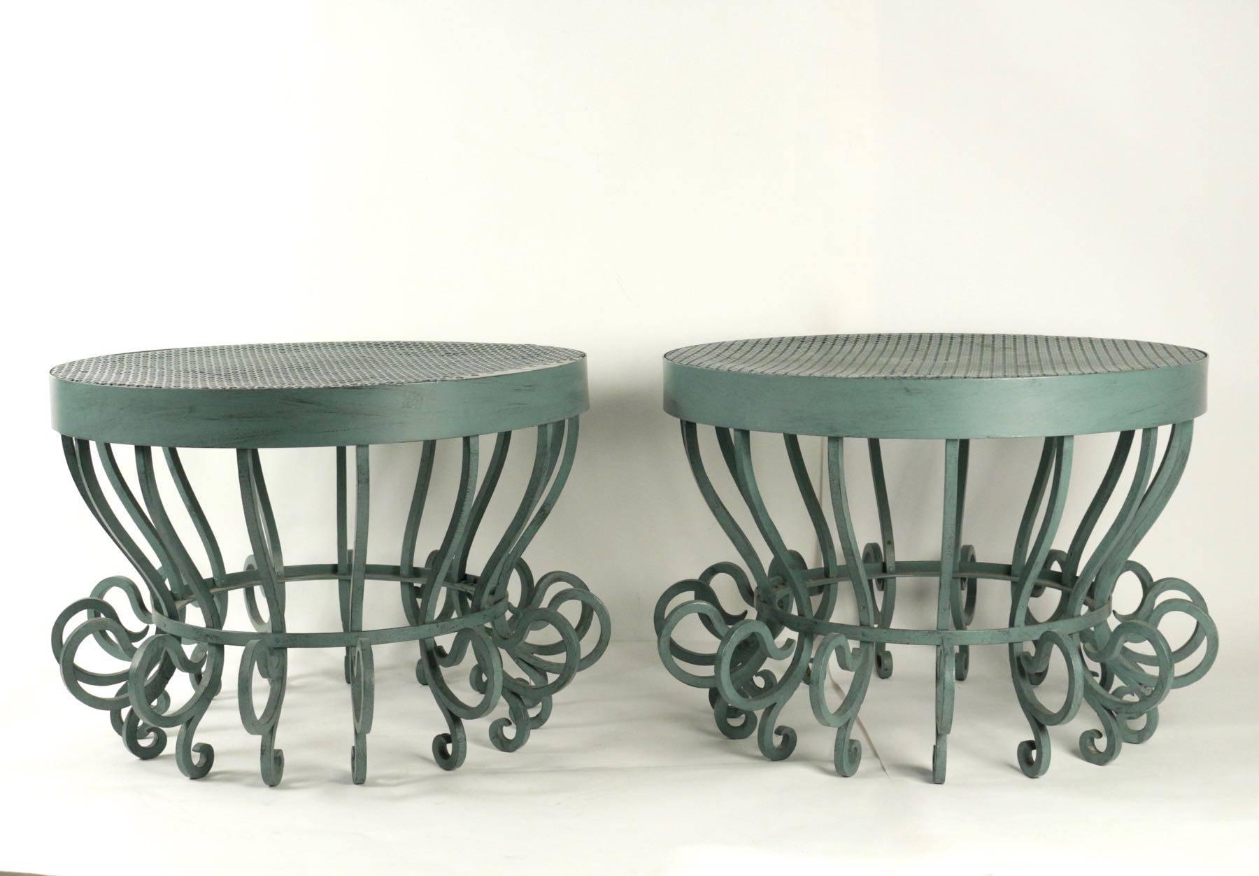 Pair of very elegant coffee table bases from the 2oth century in painted wrought iron.
 