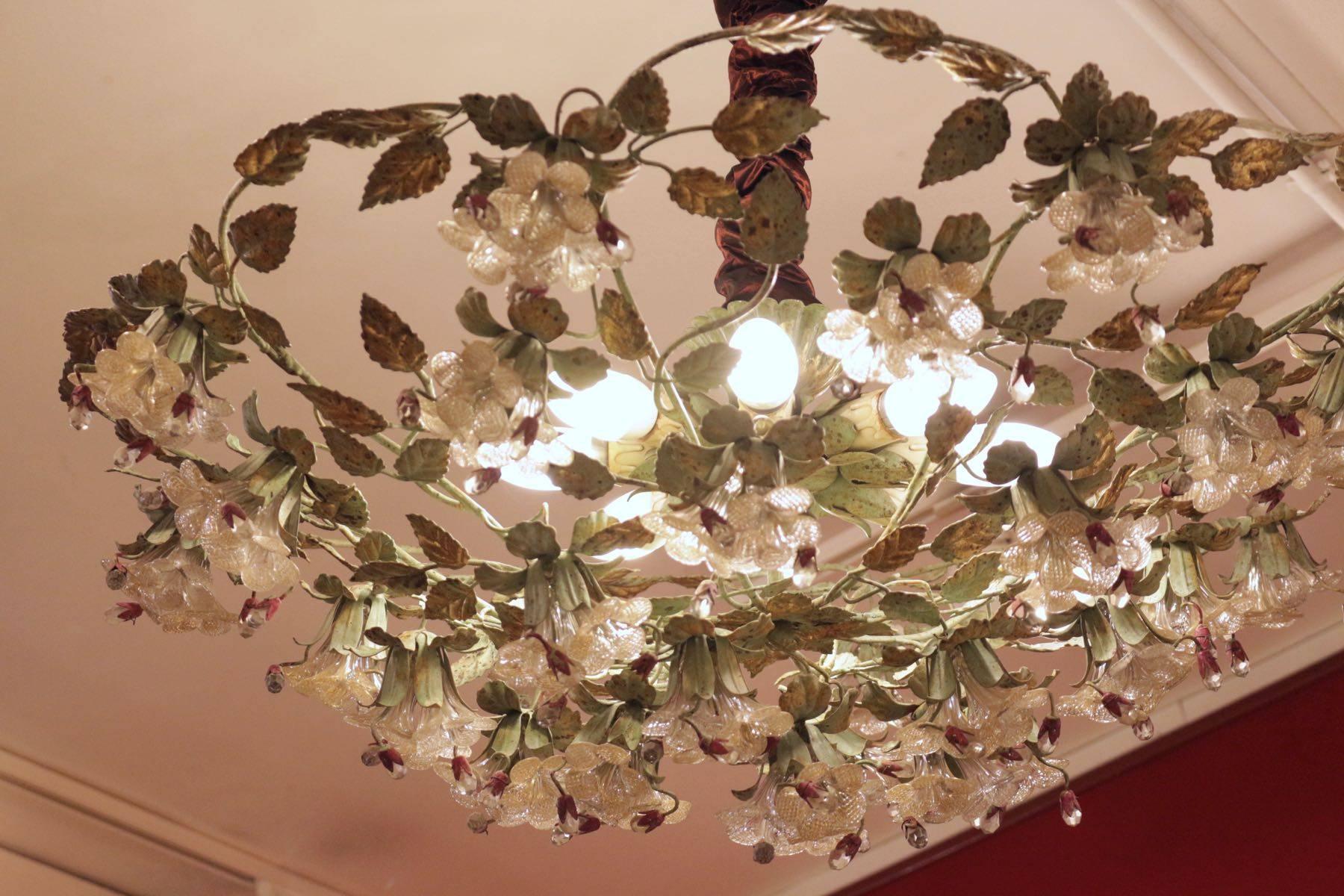 Light fixture from the 1950s-1960s in painted metal with flowers and glass crystals. Eight lights.
 