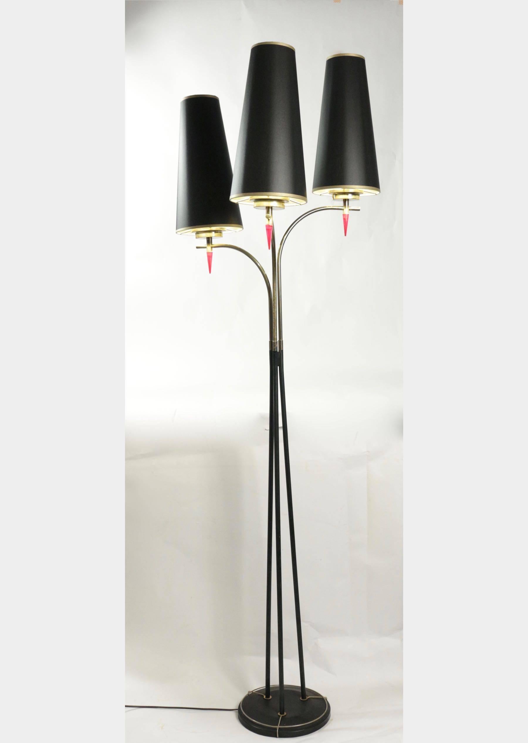 Standing floor lamp from the 1960s in metal paint and brass. Three lights.
   