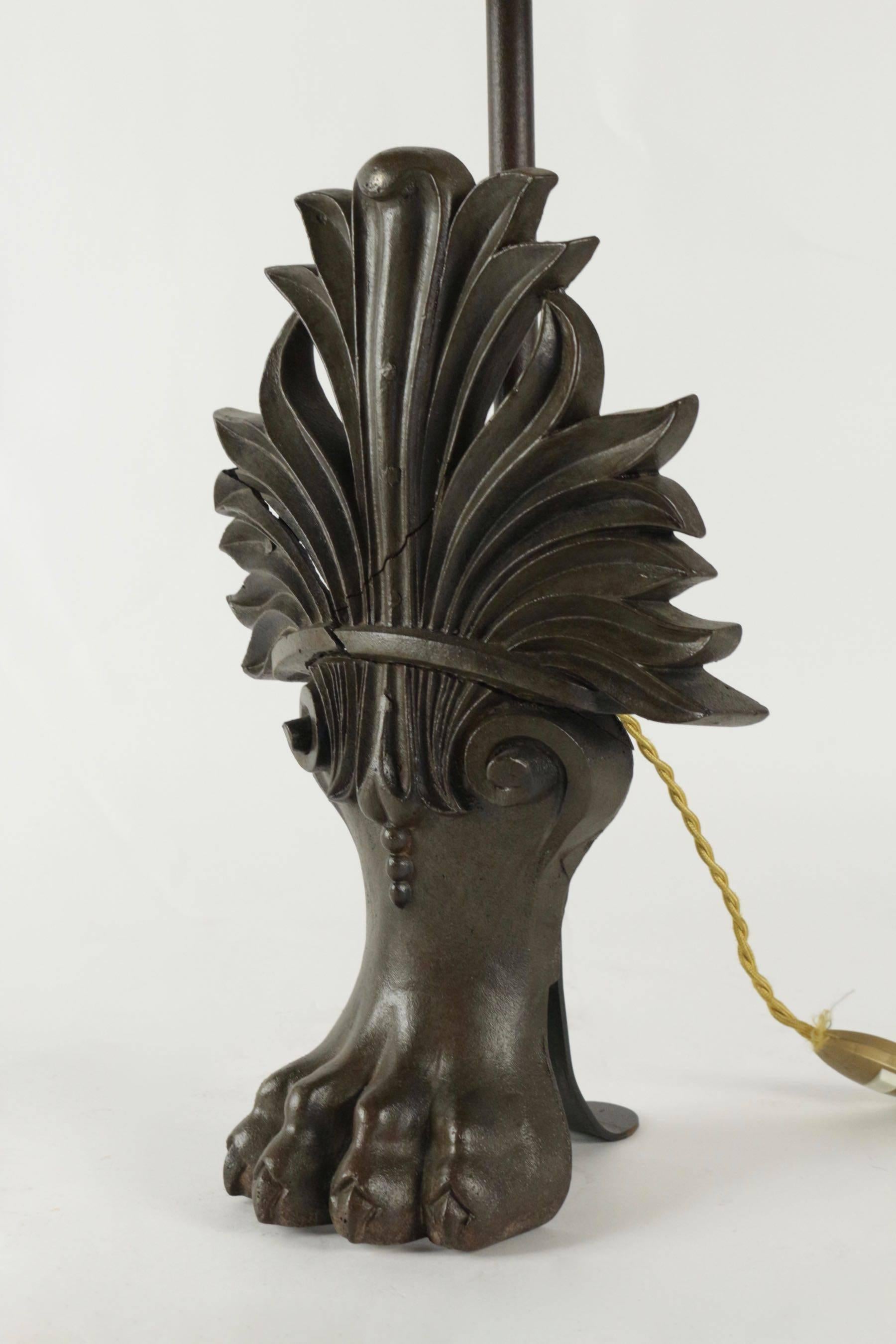 Antique bathtub lions claw foot changed into a lamp, 19th century.
 